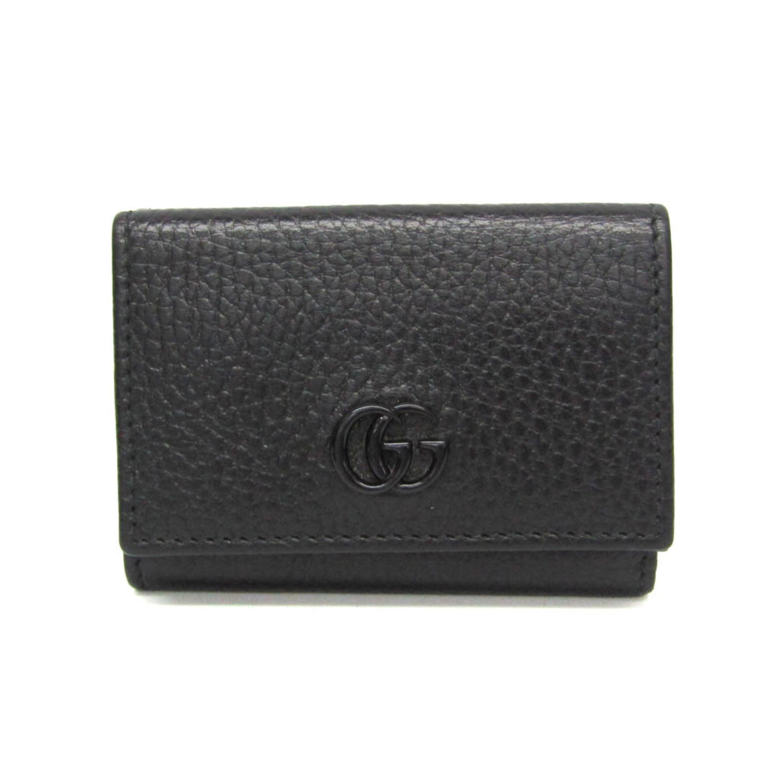 Gucci Wallet (Tri-Fold) Leather: Gucci Wallet (Tri-Fold) Leather Black Tri-Fold Leather Wallet from Gucci, featuring a snap fastener closure and inner pockets for organization. This used item has hardly any traces of usage, making it