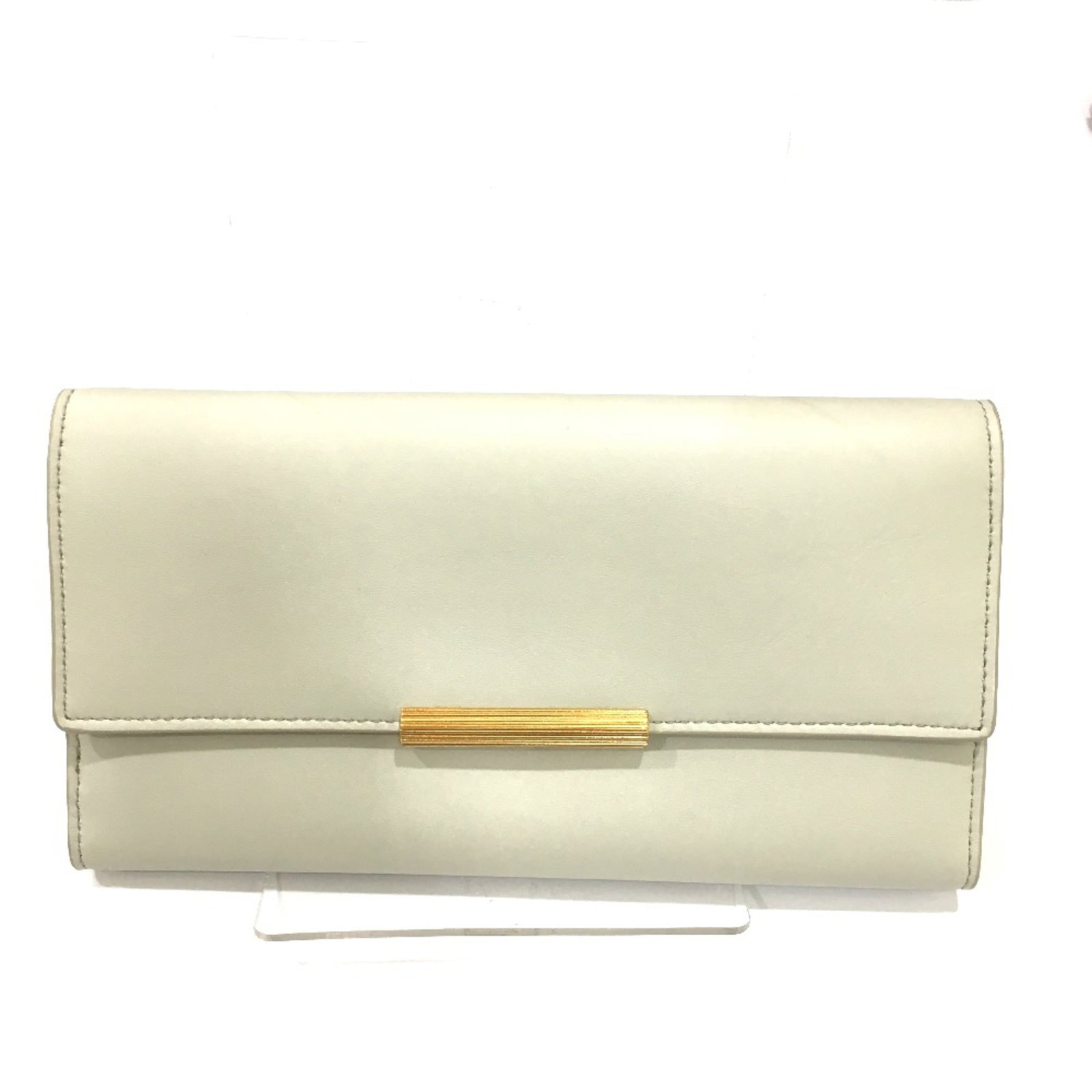 Bottega Veneta Long Wallet (Bi-Fold) Leather: Bottega Veneta Long Wallet (Bi-Fold) Leather Bottega Veneta's iconic long wallet features a crisp white leather exterior, with clean lines and minimal embellishments. This bi-fold design offers ample 