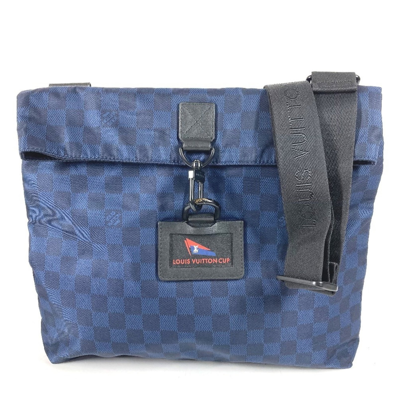 Nylon Louis Vuitton Shoulder Bag: Nylon Louis Vuitton Shoulder Bag Nylon Louis Vuitton Shoulder Bag in Blue, featuring a classic design with a 36cm x 32cm x 4.5cm size and trims that show signs of usage. This bag is made from nylon