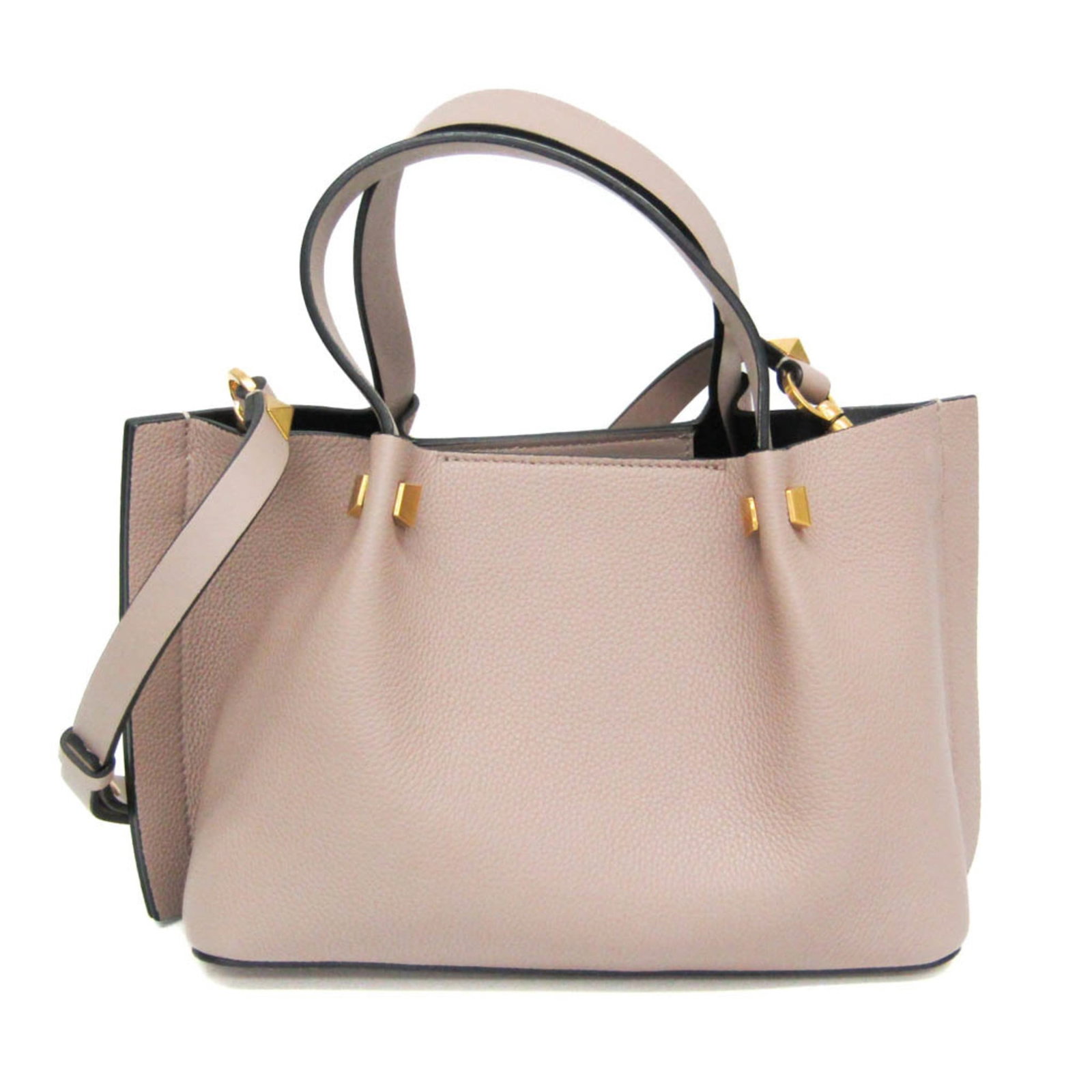 Garavani Valentino Handbag Leather: Garavani Valentino Handbag Leather Dusty pink leather wraps around the handle, adding a touch of femininity to this elegant Valentino Garavani handbag. With adjustable straps and a hook closure, it's