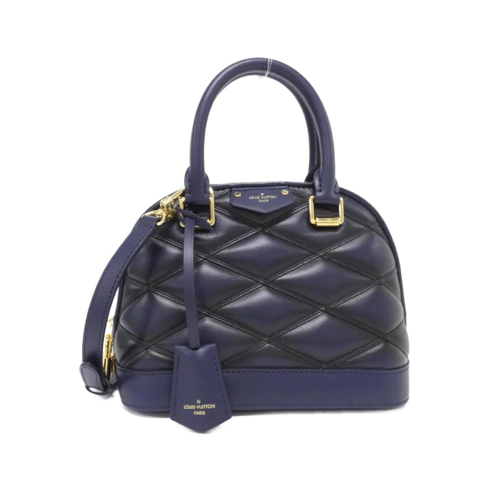 Handbag Leather Louis Vuitton: Handbag Leather Louis Vuitton Navy blue handbag made from high-quality lamb leather, featuring gold hardware and classic Louis Vuitton design. This pre-owned bag has a few traces of usage, with some