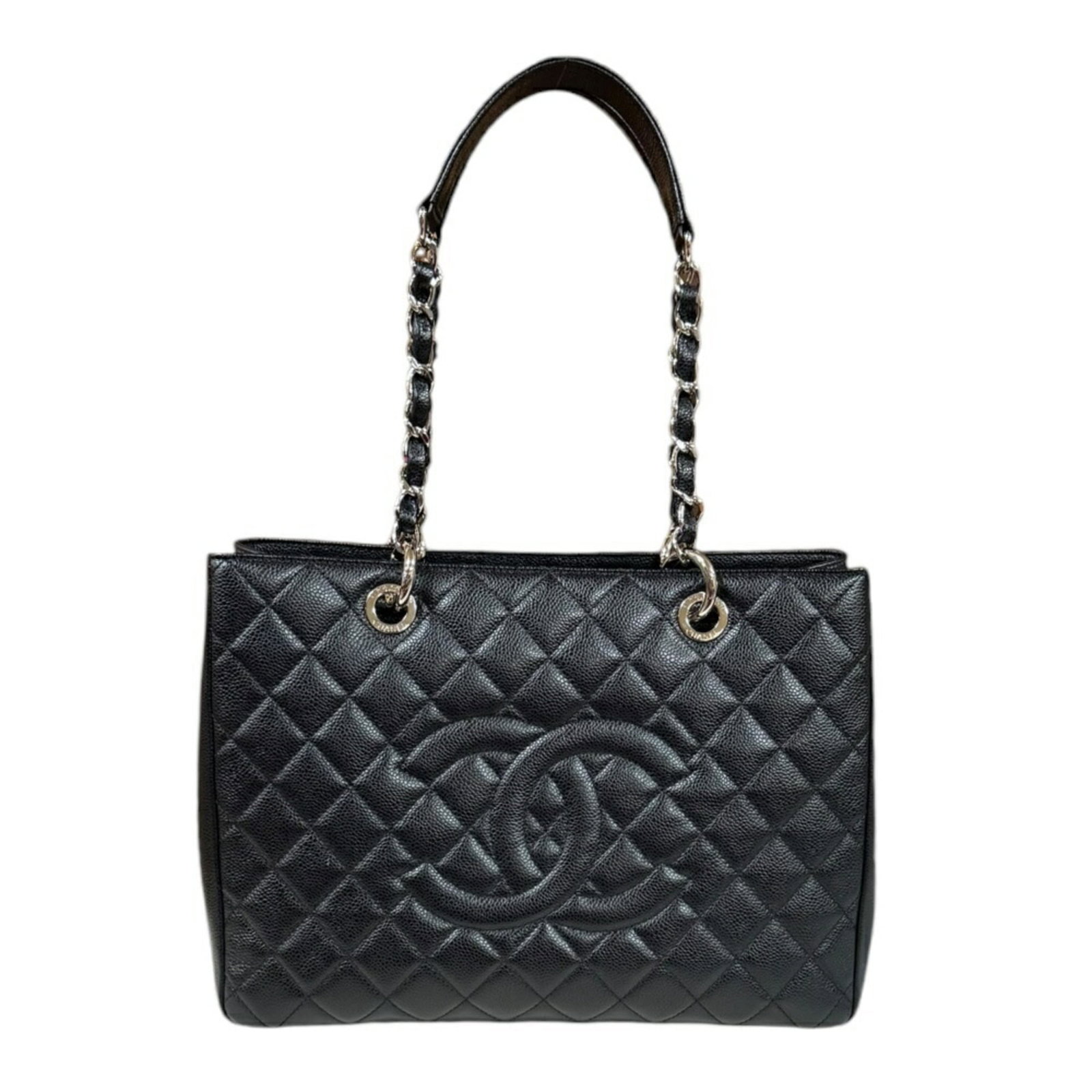 Caviar Leather Chanel Tote Bag: Caviar Leather Chanel Tote Bag Caviar Leather Chanel Tote Bag in Black. This used tote bag features caviar leather, with some scratches and dirt visible but overall in very good condition. Its classic