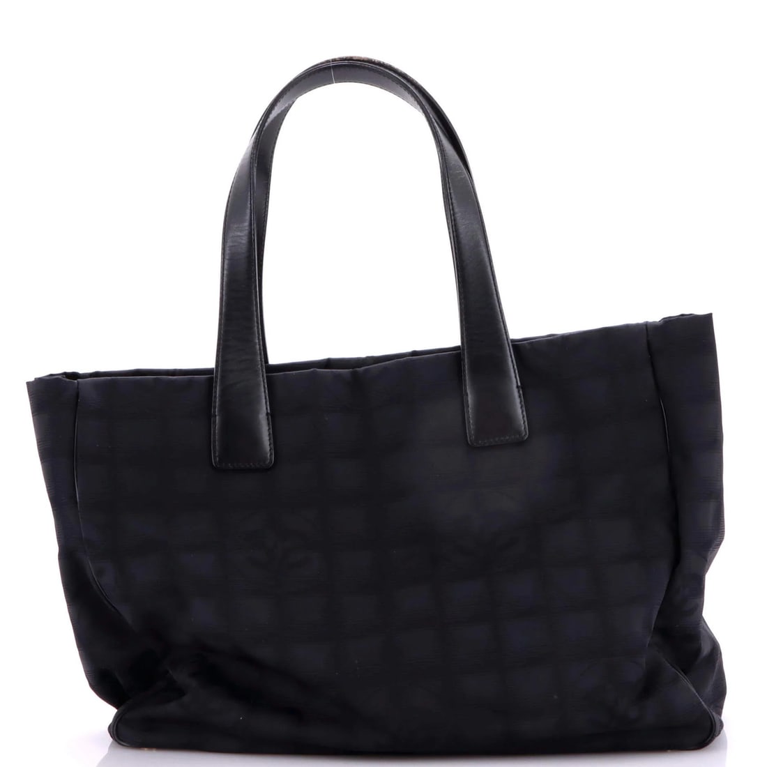 Nylon Medium Tote Travel Line Chanel: Nylon Medium Tote Travel Line Chanel Nylon Medium Tote Travel Line Chanel in Black, featuring a classic design with heavy cracking and scuffs on the handles and straps. The exterior shows signs of wea