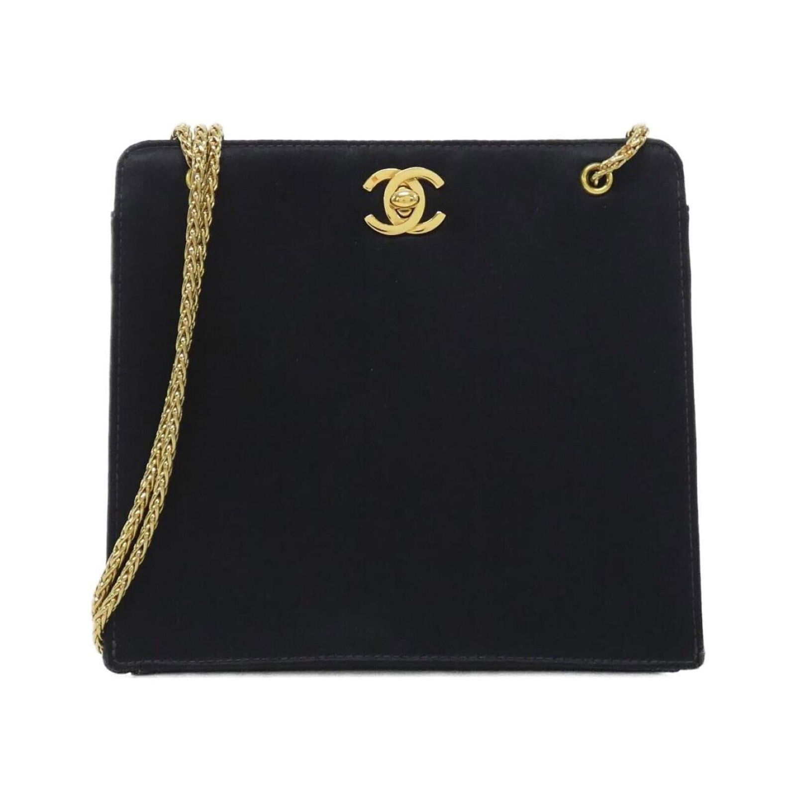 Chanel Shoulder Bag Satin: Chanel Shoulder Bag Satin Black satin shoulder bag from Chanel, measuring 16.5cm x 18.5cm x 6.5cm. This used item has a few traces of usage and some minor scratches/dirt but remains in very good