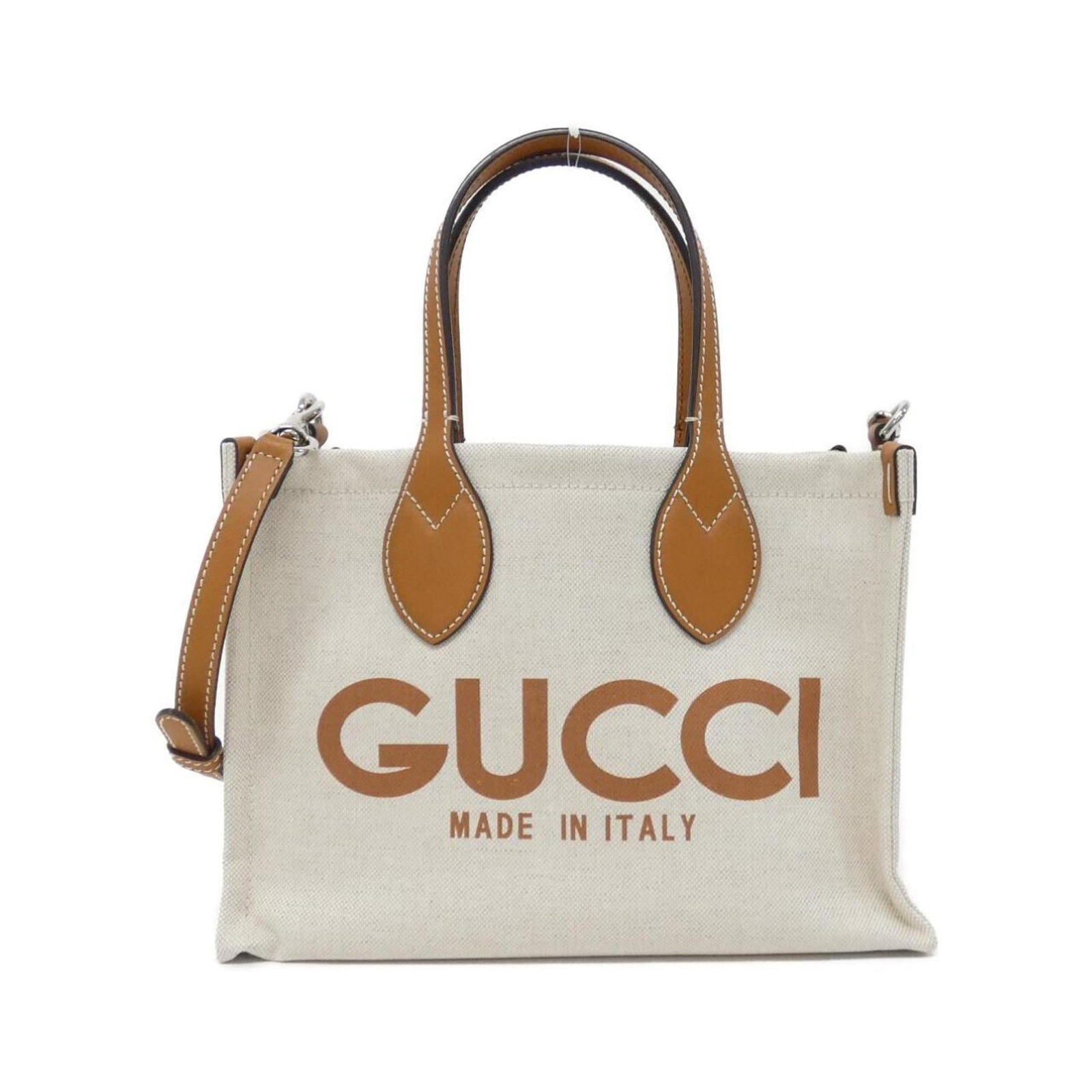 Canvas leather pouch handbag Gucci: Canvas leather pouch handbag Gucci Canvas leather pouch handbag from Gucci, featuring beige and light brown hues with silver hardware. This used item boasts a canvas and leather construction, measurin