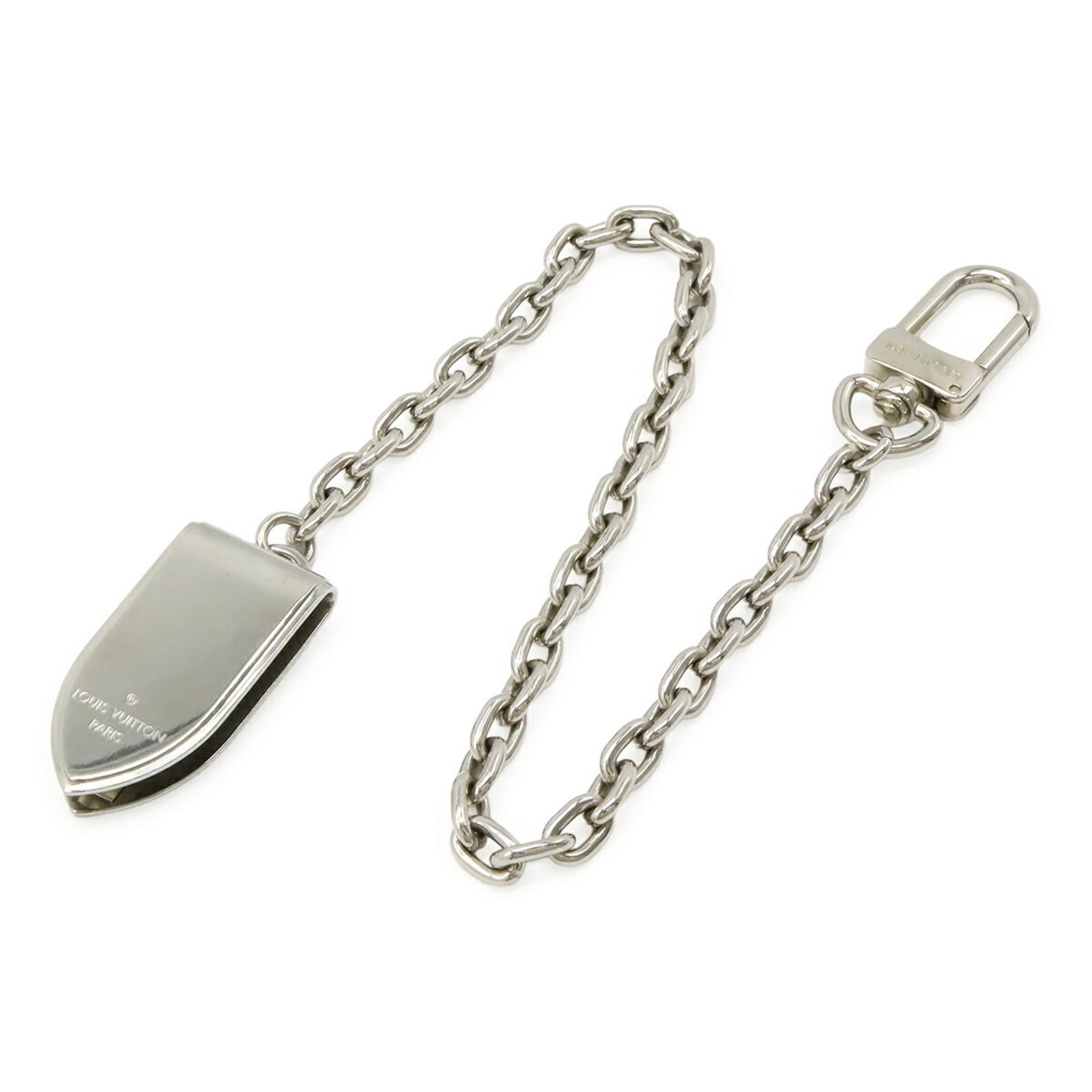 Vuitton Money Clip by Louis: Vuitton Money Clip by Louis Silver Louis Vuitton Money Clip by Louis, measuring 5cm x 2.5cm, features metal lining and a classic design. This used item shows traces of usage with minor scratches and