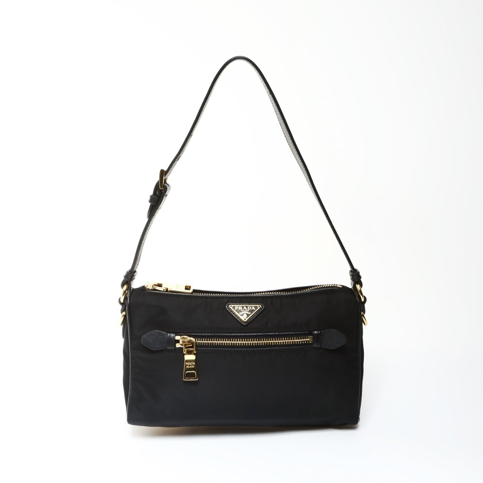 Shoulder Bag Nylon by Prada: Shoulder Bag Nylon by Prada Black Prada Shoulder Bag made from durable nylon, featuring a classic design with a strap length of 50cm-55cm. The bag has some minor scratches and dirt, but remains in