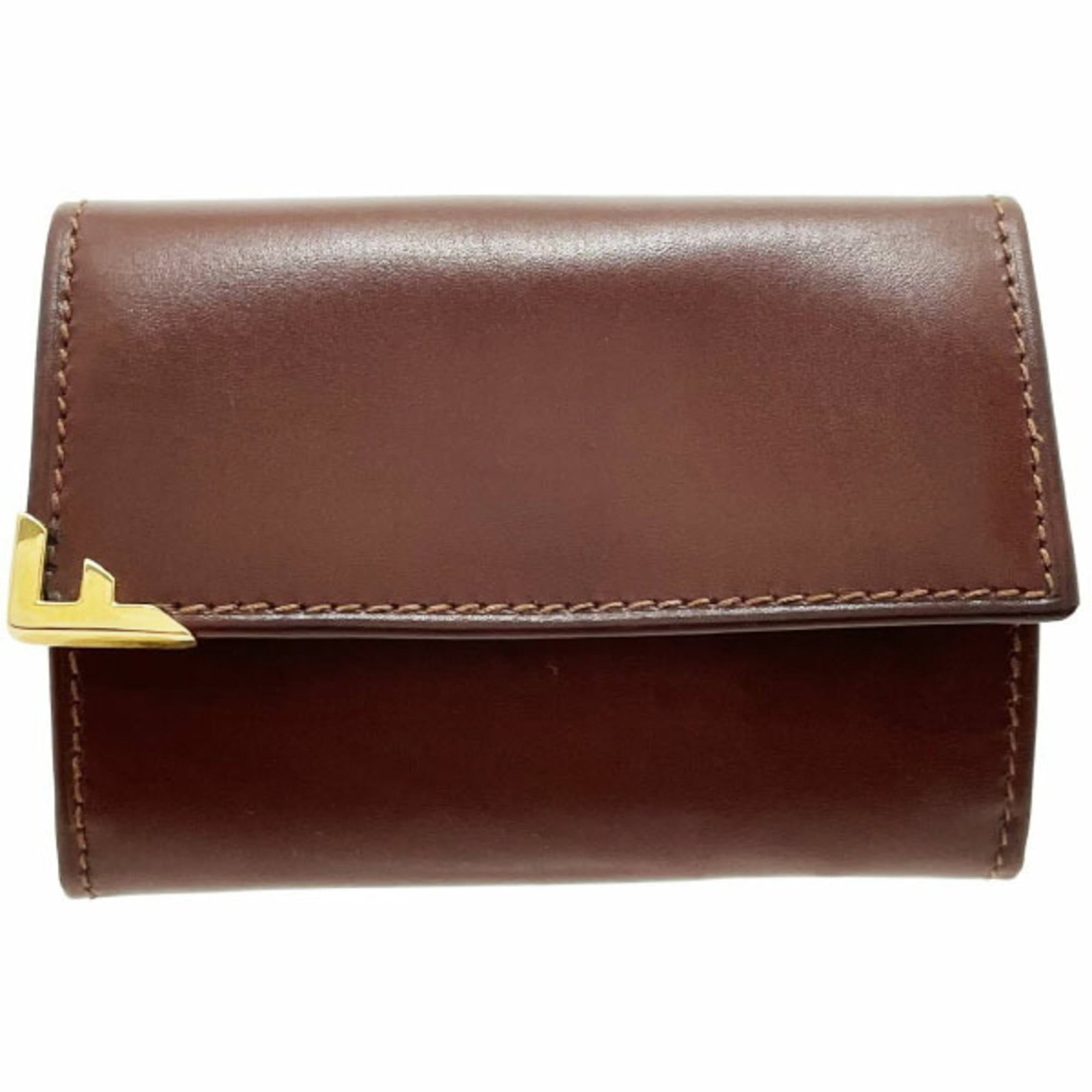 Salvatore Ferragamo Coin Purse/ Coin Case Leather: Salvatore Ferragamo Coin Purse/ Coin Case Leather The Salvatore Ferragamo Coin Purse/ Coin Case Leather is a classic accessory with a rich history, featuring genuine brown leather and a timeless desig