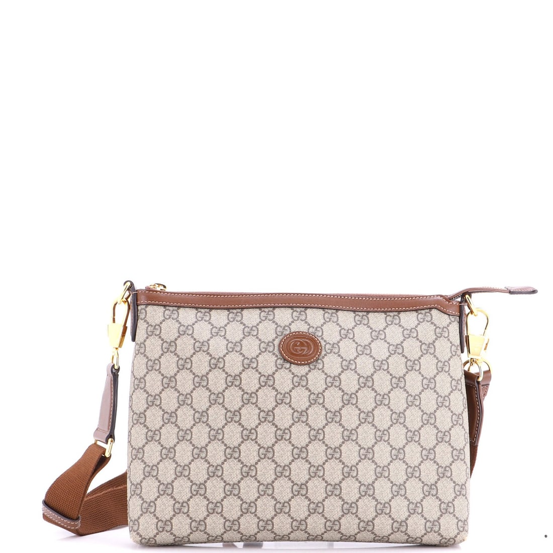 Gucci GG patch medium coated canvas messenger bag wristlet interlocking: Gucci GG patch medium coated canvas messenger bag wristlet interlocking Medium coated canvas Gucci messenger bag with interlocking G patch and wristlet strap, featuring brown exterior and neutral inte