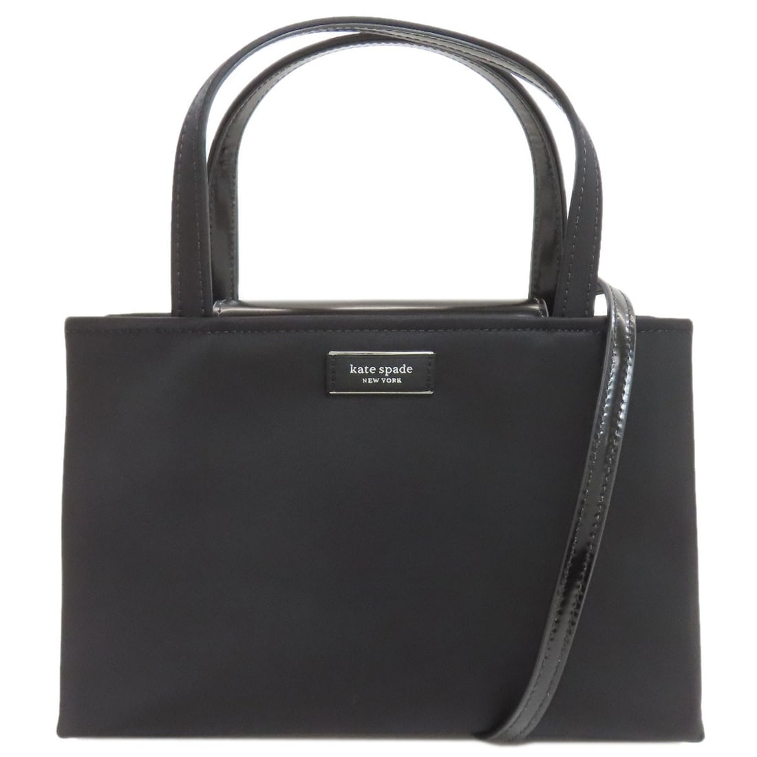 Kate Spade 2Way Handbag Nylon: Kate Spade 2Way Handbag Nylon Kate Spade's 2Way Handbag Nylon boasts a sleek black exterior made from durable nylon, making it a versatile and practical choice for everyday use. The bag's design
