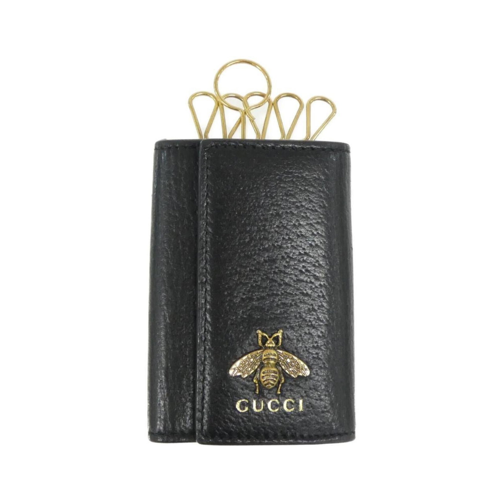 Gucci Animalier 523683 Dj20T Key Case: Gucci Animalier 523683 Dj20T Key Case The Gucci Animalier 523683 Dj20T Key Case boasts sleek, black leather construction with subtle signs of wear, hinting at its well-loved status. A few minor scratc