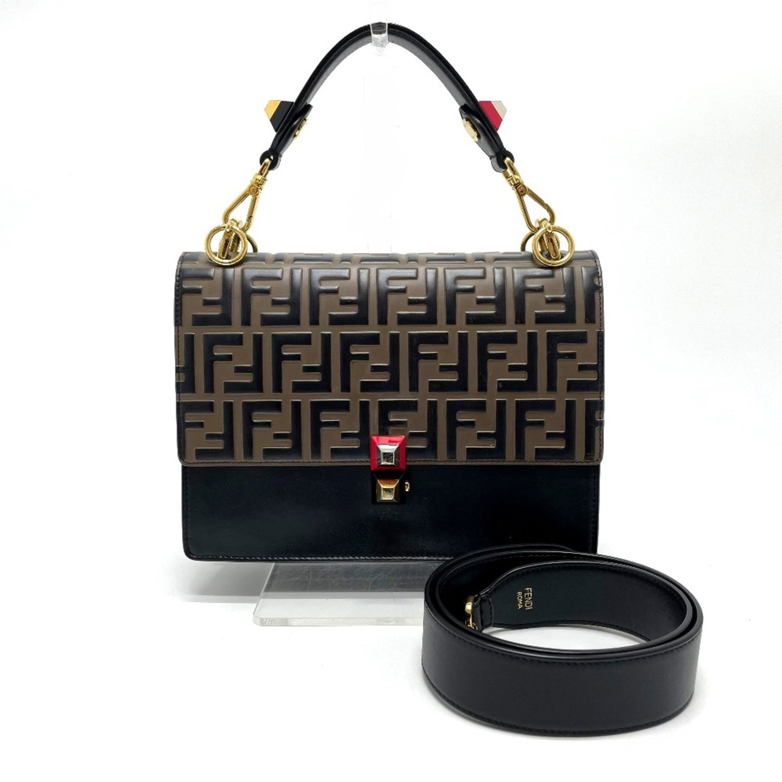 Handbag Leather by Fendi: Handbag Leather by Fendi Brown Fendi leather handbag with classic design, measuring 17.5cm x25cm x11cm, features a 12.2inch handle and shoulder strap that reaches 36.1inch. The bag has been used,