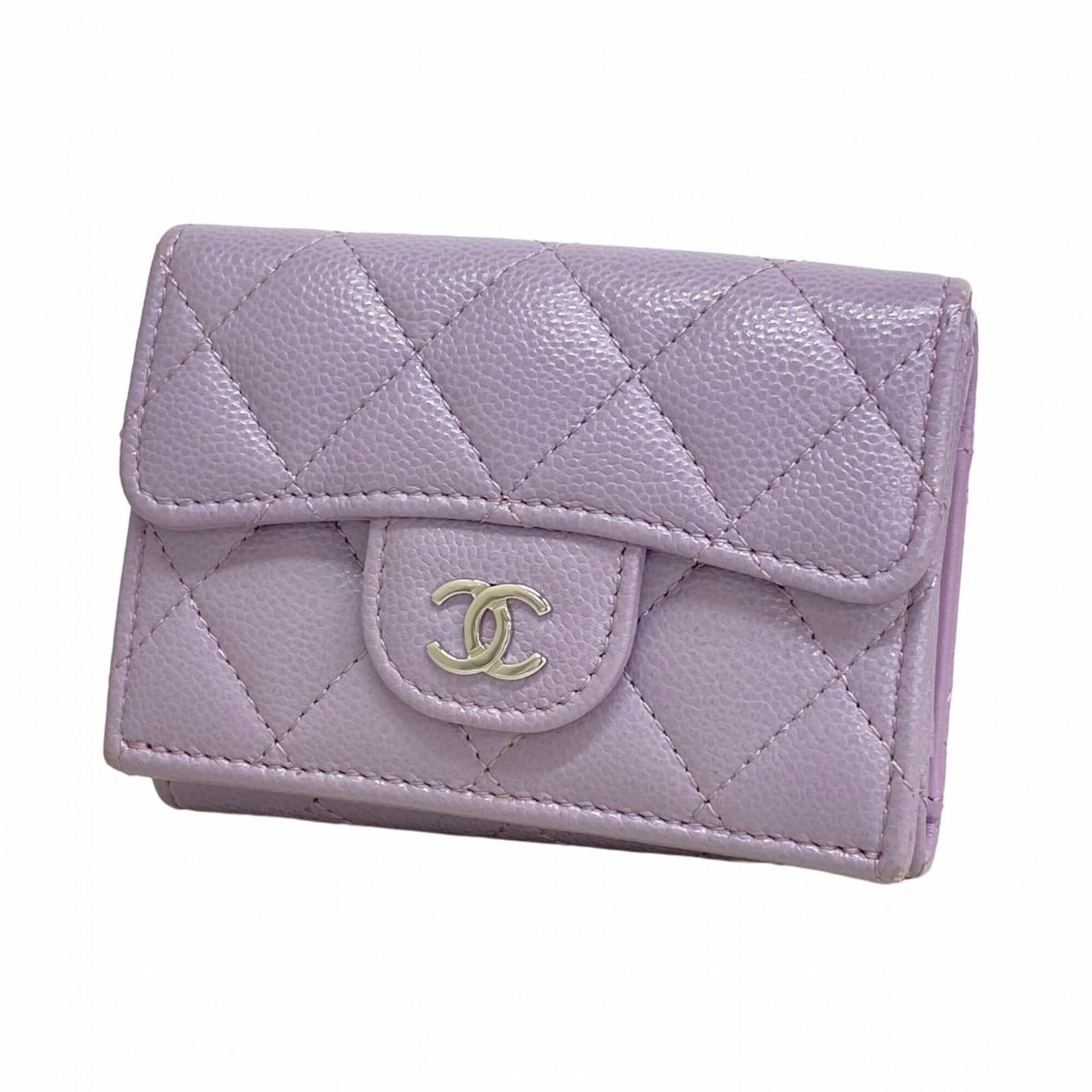 Chanel Wallet (Tri-Fold) Grained Calfskin: Chanel Wallet (Tri-Fold) Grained Calfskin Tri-fold wallet in rich purple grained calfskin, offering a classic and timeless design. With its sturdy size and durable material, it remains a reliable