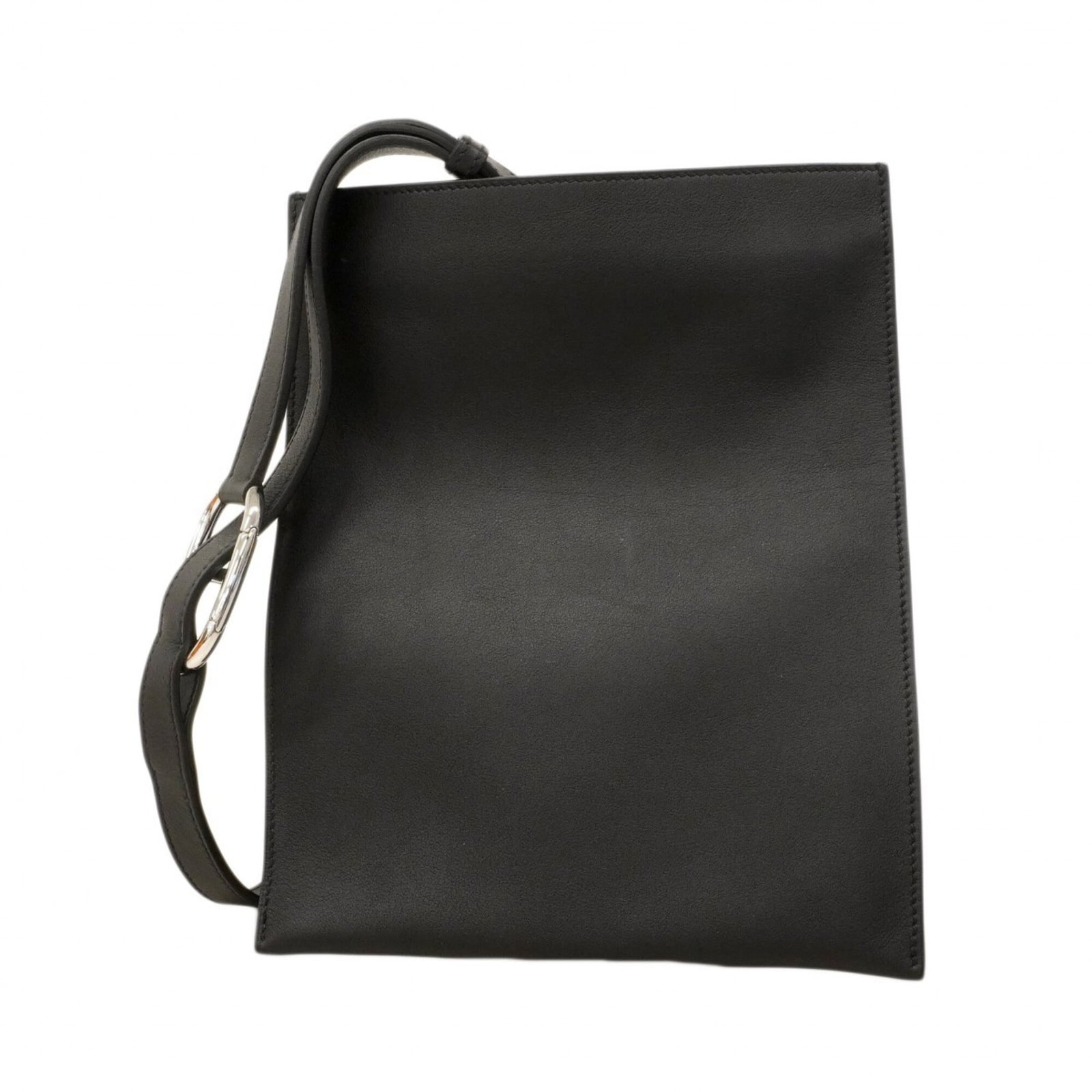 Swift Leather Hermes Sling Bag: Swift Leather Hermes Sling Bag Swift Leather Hermes Sling Bag in black swift leather with silver hardware. This used sling bag has some scratches and dirt, but remains in very good condition. A few tr