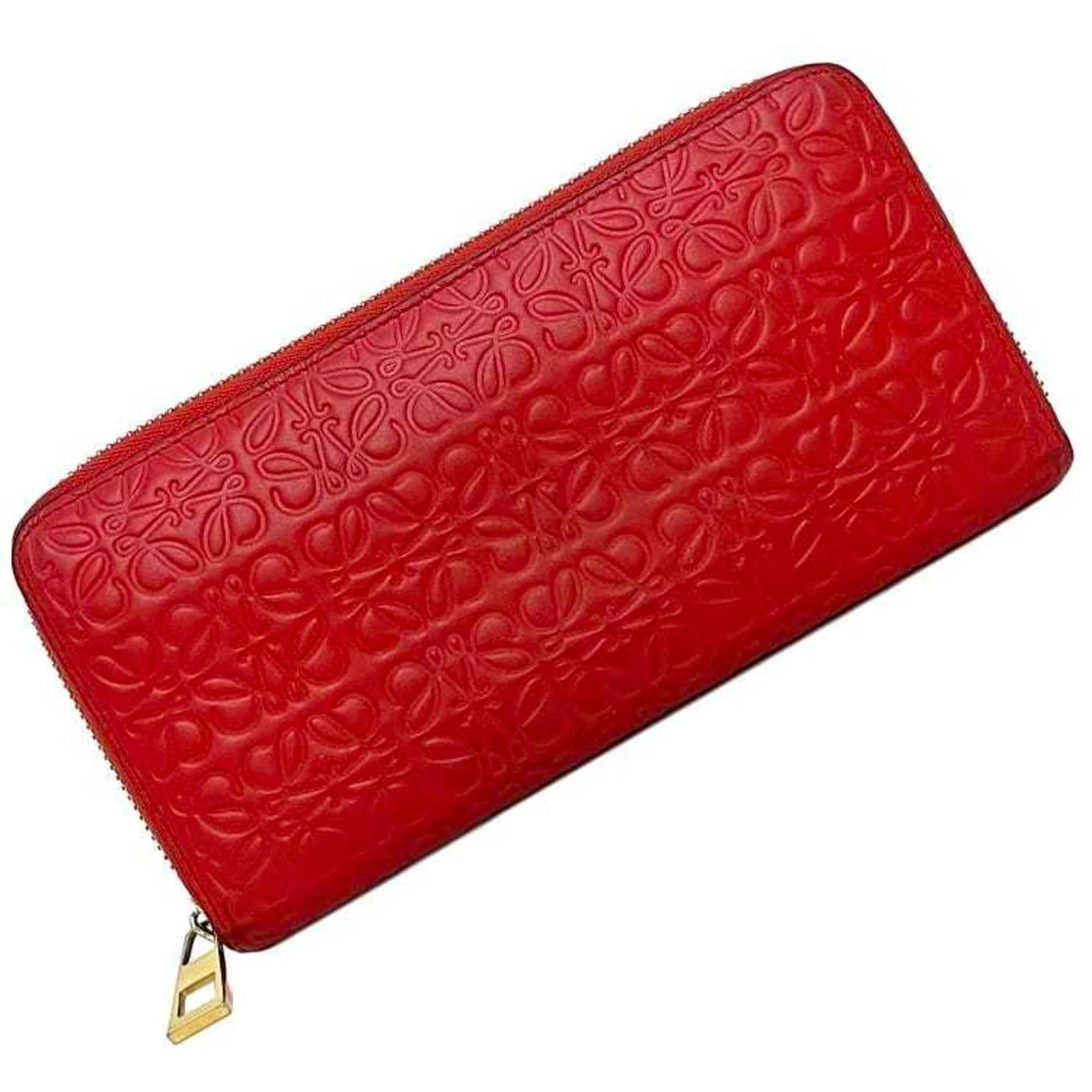 Loewe Long Wallet (Bi-Fold) Leather: Loewe Long Wallet (Bi-Fold) Leather Red Loewe bi-fold leather wallet with zipper closure, featuring an inner coin purse and card slot. The classic design boasts a long, rectangular shape with a
