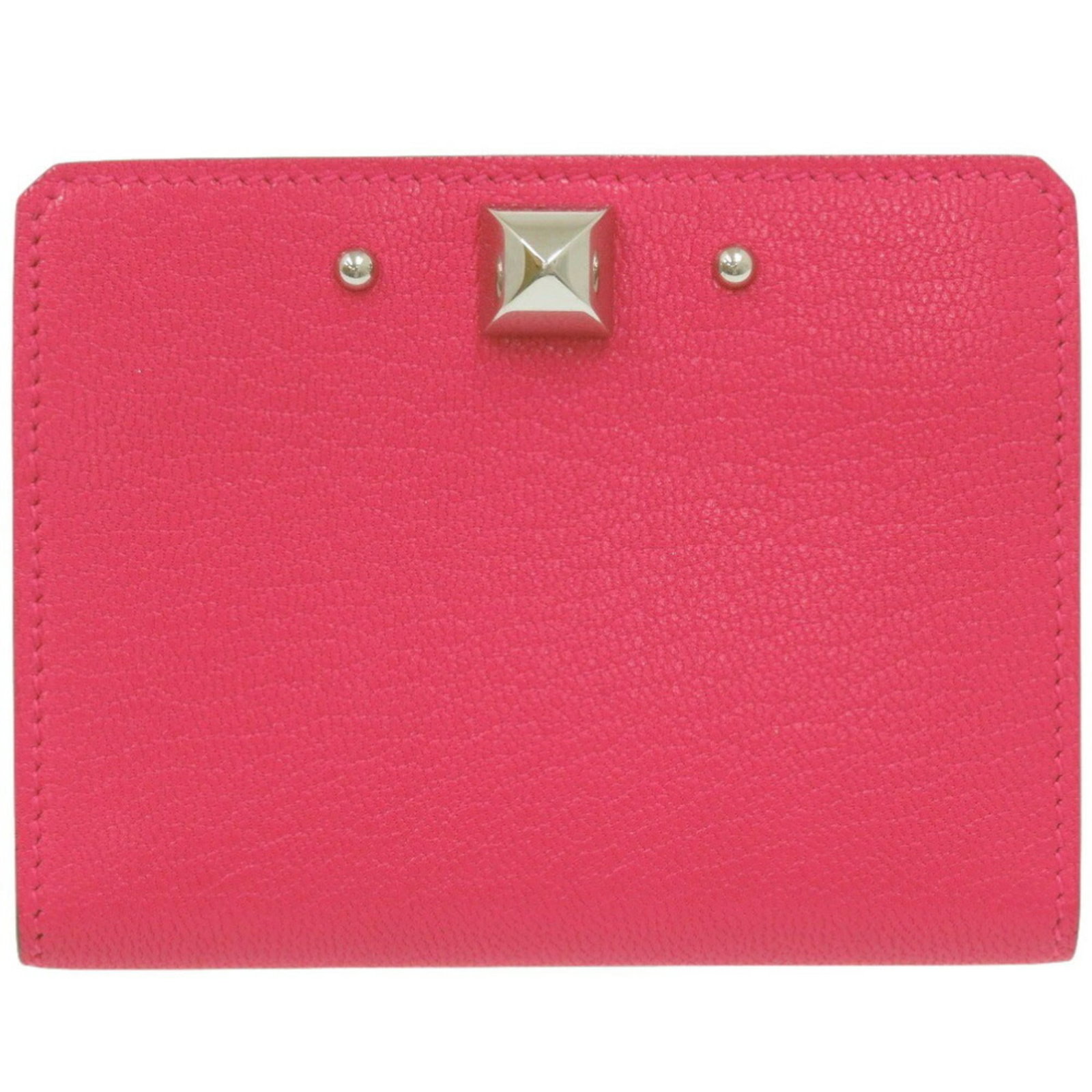 Chevre leather card case by Hermes: Chevre leather card case by Hermes Chevre leather card case by Hermes, in mint condition with like-new details, boasts a unique and luxurious material. The used item retains its original mint