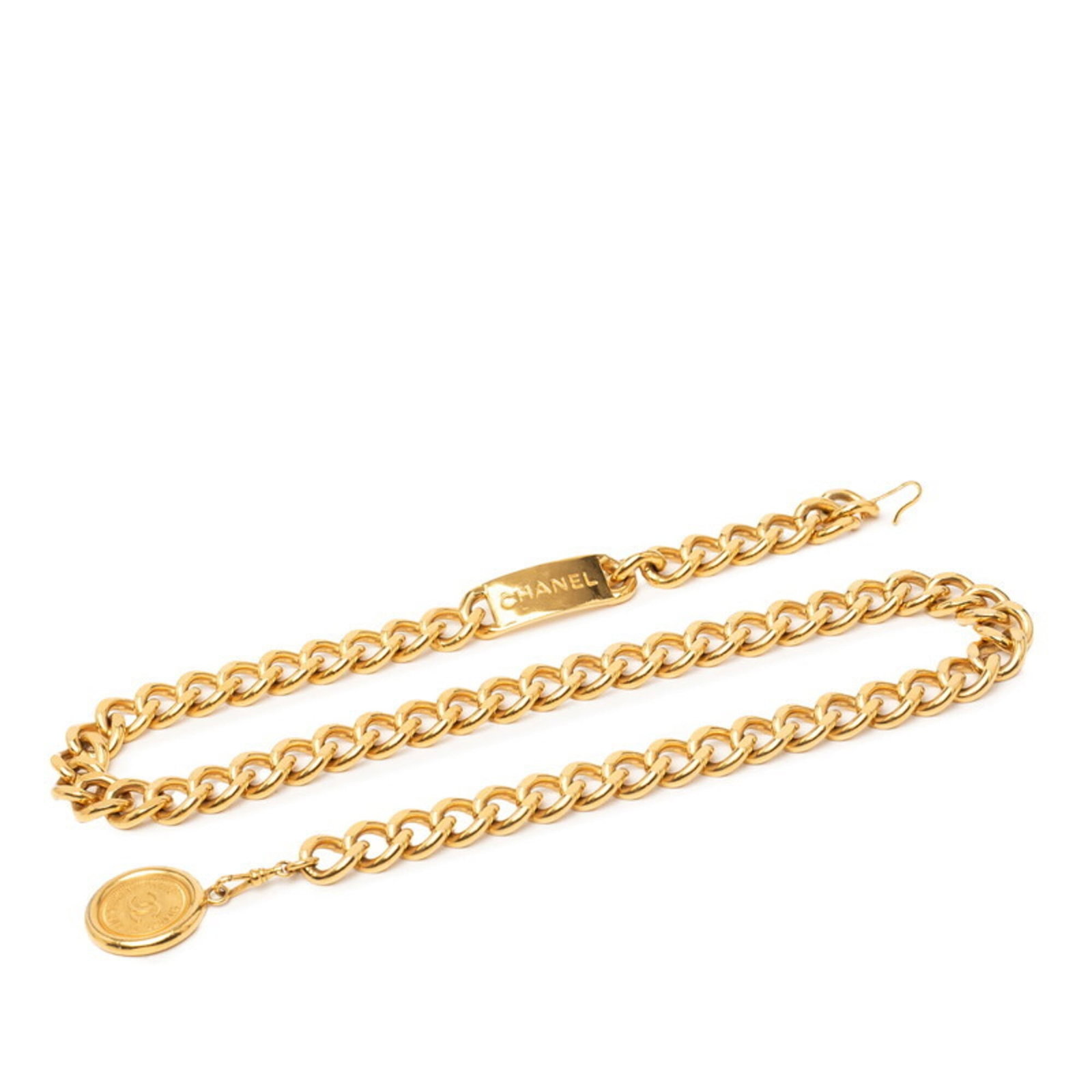 Chain Belt By Chanel: Chain Belt By Chanel Gold Chain Belt by Chanel, 82cm in length with a slim 1.7cm width, offering a sleek and sophisticated accessory for women. The belt showcases subtle signs of usage, including