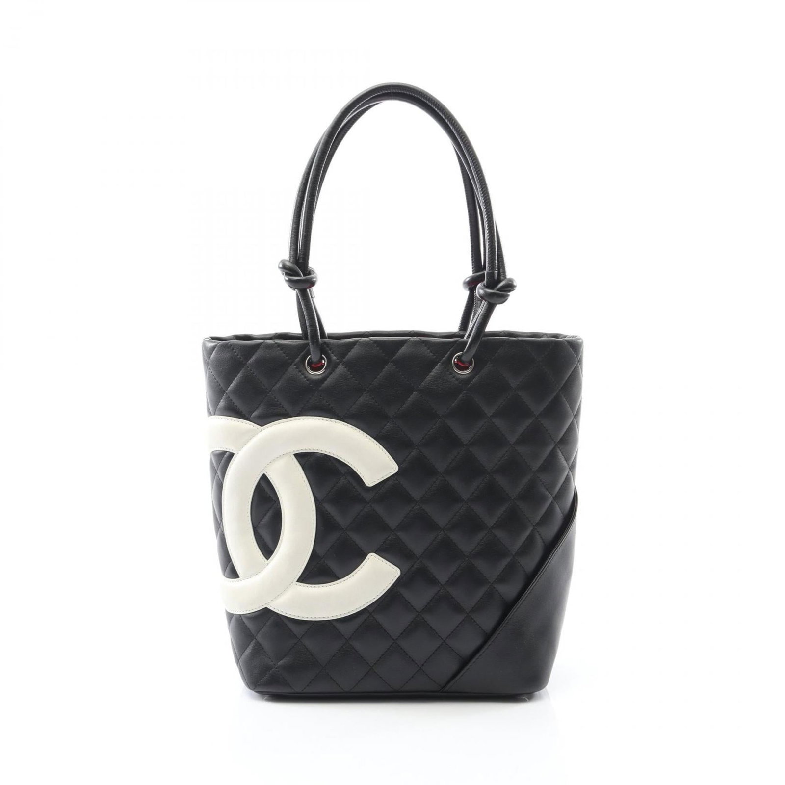 Tote Bag Leather from Chanel: Tote Bag Leather from Chanel Tote Bag Leather from Chanel - A Timeless Classic. This iconic tote bag features genuine leather construction, with a sleek black and silver finish that exudes timeless el