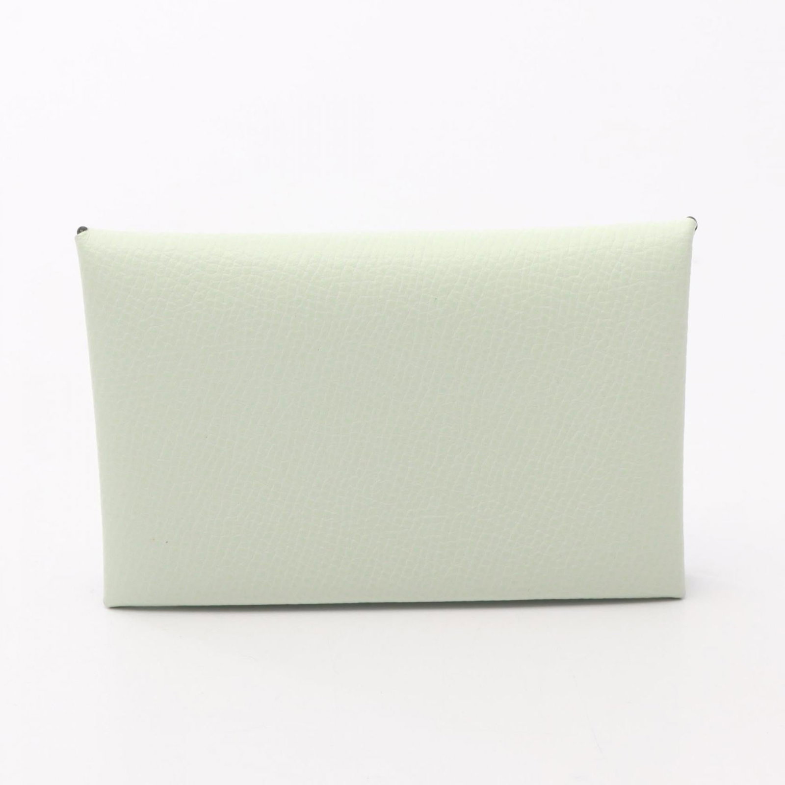 Hermes Coin Purse/ Coin Case Epsom Leather: Hermes Coin Purse/ Coin Case Epsom Leather Epsom leather craftsmanship shines in this Hermes coin purse, its green hue adding a touch of elegance. With a size of 7cm x 10.5cm x 1.5cm, it's perfect