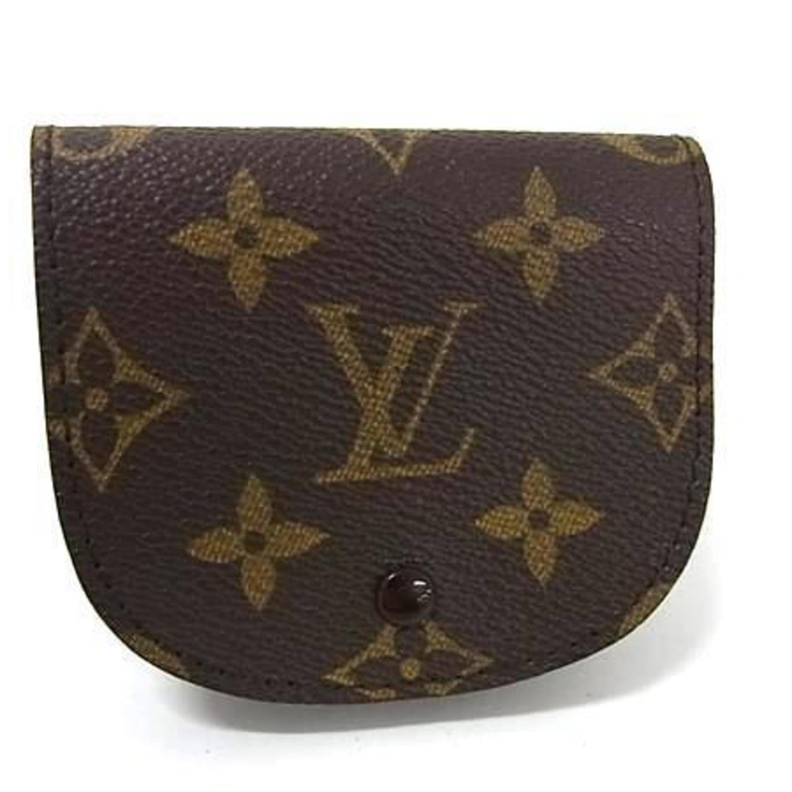 Louis Vuitton Coin Purse/ Coin Case Monogram: Louis Vuitton Coin Purse/ Coin Case Monogram Monogrammed with iconic Louis Vuitton style, this brown coin purse features the signature monogram closure and a small inner pocket for added convenience.