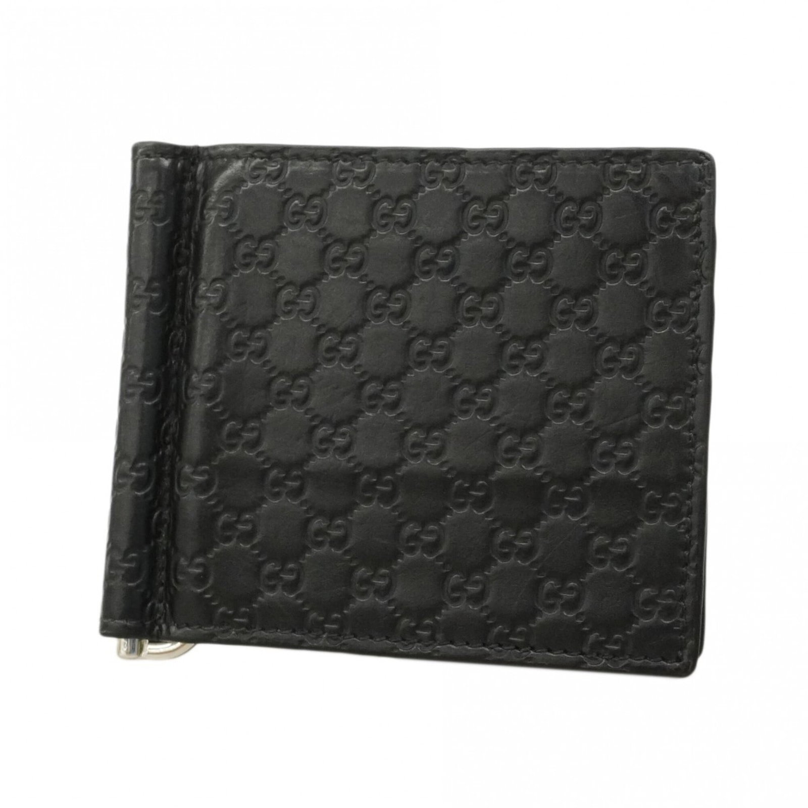 Money Clip Leather Gucci: Money Clip Leather Gucci Black leather Gucci money clip with visible traces of usage and minor scratches. The classic design remains intact, showcasing the brand's signature style. Measuring 9cm x 10.