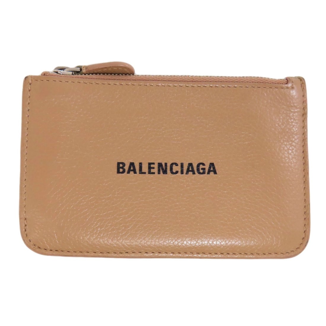 Coin purse leather logo balenciaga: Coin purse leather logo balenciaga Beige leather coin purse with Balenciaga logo. Made from high-quality material, this stylish accessory features the iconic brand's signature design. The classic beig