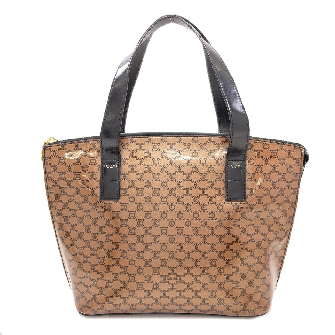 Celine Macadam Tote Enamel: Celine Macadam Tote Enamel Enamel exterior gives the Celine Macadam Tote Bag a distinctive, long-lasting finish. The bag's brown color and classic style make it a versatile accessory for everyday