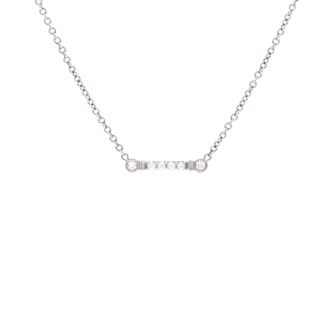 Tiffany & Co. Fleur de Lis Key Bar Pendant Necklace Platinum and Diamonds: Tiffany & Co. Fleur de Lis Key Bar Pendant Necklace Platinum and Diamonds Tiffany & Co.'s Fleur de Lis Key Bar Pendant Necklace shines with platinum and diamonds, its intricate design a testament to