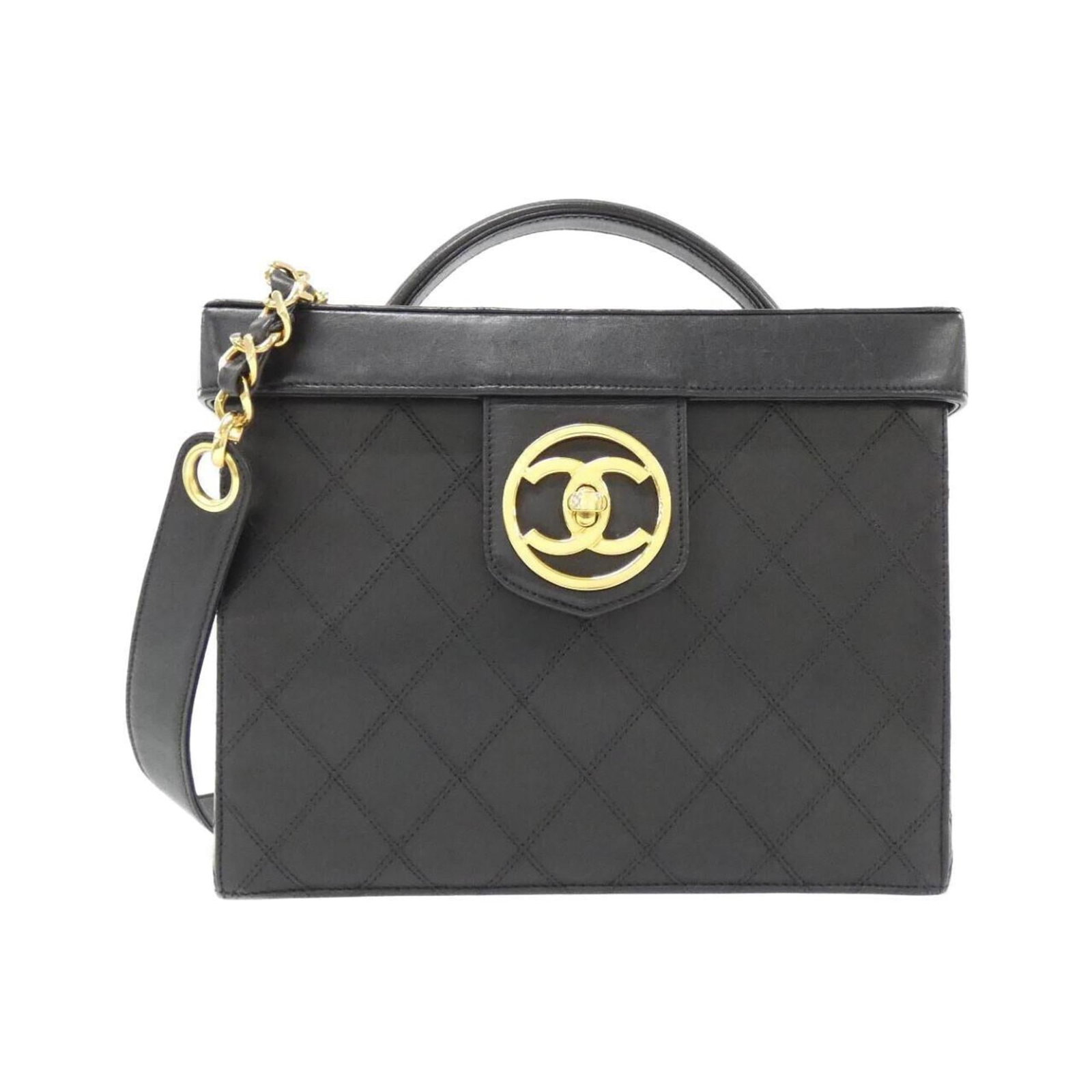 Chanel Handbag Leather: Chanel Handbag Leather Black lambskin Chanel handbag with gold hardware, offering a sleek and sophisticated design. The bag features a few traces of usage, including some scratches and dirt, but