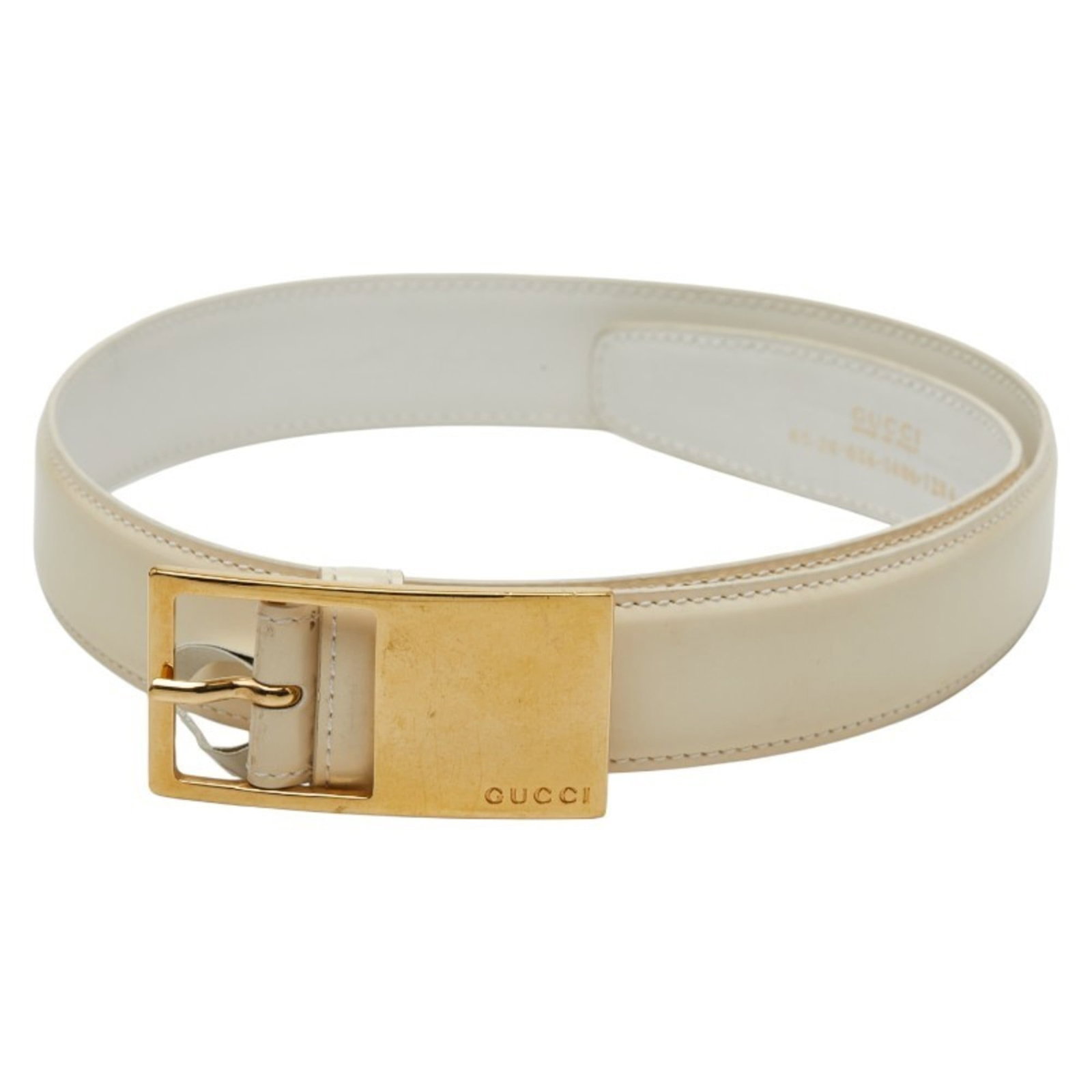 Standard Belt Gucci: Standard Belt Gucci White leather standard belt from Gucci, featuring a classic design with subtle signs of wear and tear. Measuring 61.5cm-66.5cm in length, this used belt offers a timeless look for 