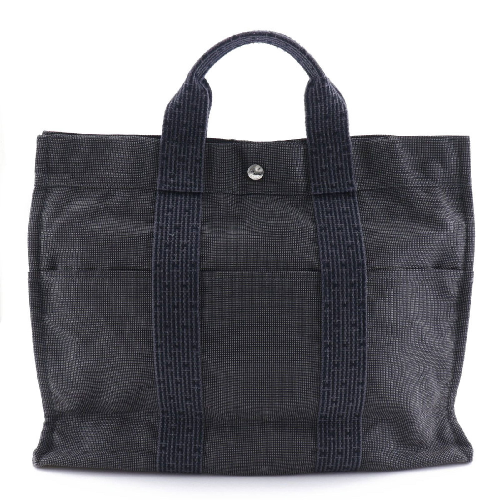 Hermes Handbag Nylon Canvas: Hermes Handbag Nylon Canvas Gray Hermes Handbag Nylon Canvas, 32cm x 42cm x 11cm. Brought to you in used condition with traces of usage and minor scratches/dirt. A versatile canvas handbag from the ic