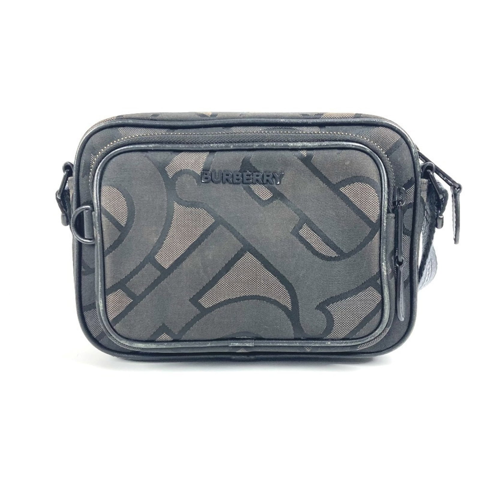 Nylon Canvas Pochette Shoulder Bag Burberry: Nylon Canvas Pochette Shoulder Bag Burberry Black and gray nylon canvas pochette shoulder bag from Burberry, featuring a classic design with a few traces of usage visible. The bag has some scratches