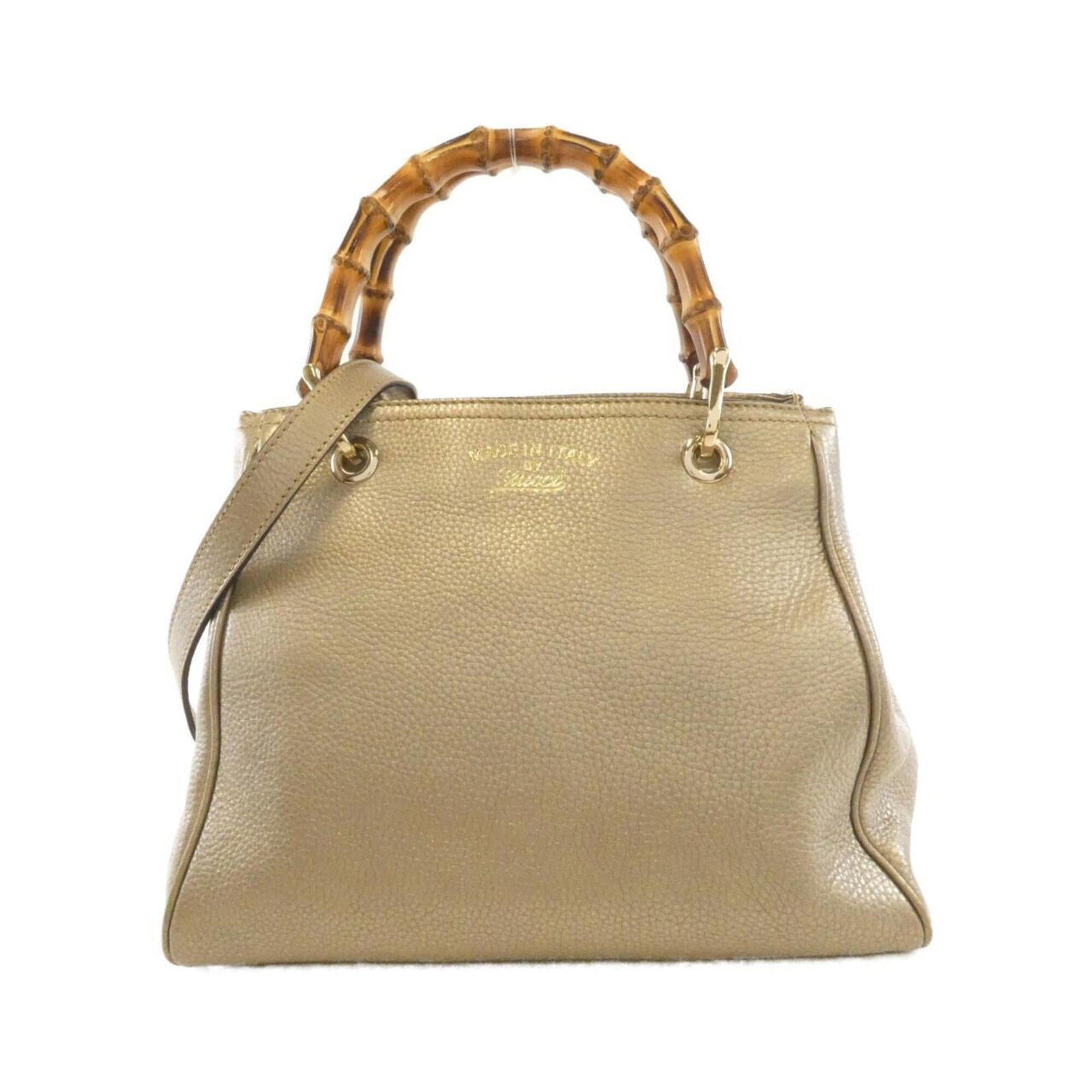 Handbag Leather Gucci: Handbag Leather Gucci Gucci handbag in gold leather with matching hardware, featuring a classic design. The bag has some minor scratches and dirt from previous use, but remains in very good condition