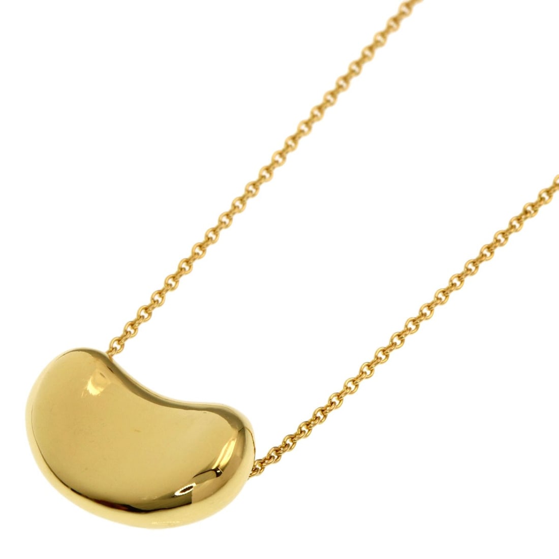 Bean Necklace Tiffany&Co K18 Yellow Gold: Bean Necklace Tiffany&Co K18 Yellow Gold K18 Yellow Gold Bean Necklace from Tiffany&Co. This elegant necklace boasts a sleek design, crafted from high-quality K18 yellow gold that adds a touch of