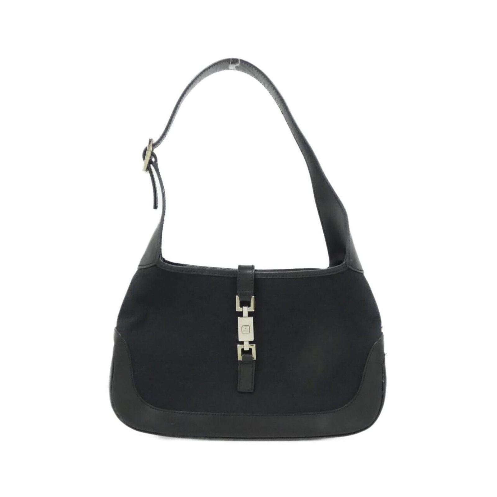Gucci Shoulder Bag Gg Canvas: Gucci Shoulder Bag Gg Canvas Gucci Shoulder Bag in Gg Canvas features a sleek black design. The bag's canvas material has some traces of usage, with minor scratches and dirt visible, but overall