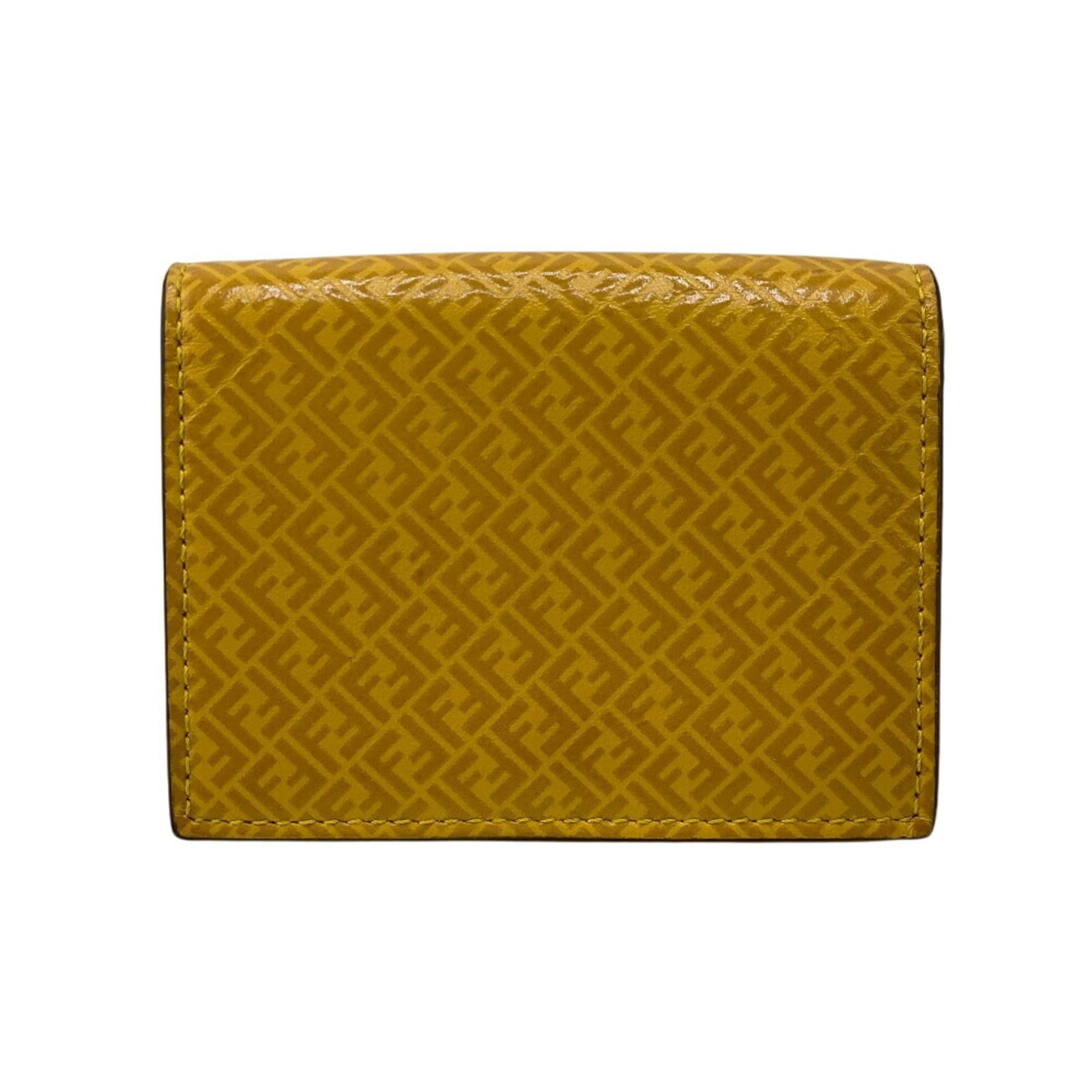Fendi wallet leather tri fold: Fendi wallet leather tri fold Yellow Fendi leather tri-fold wallet with visible traces of usage and minor scratches, offering a unique blend of style and everyday functionality. Made from high-quality