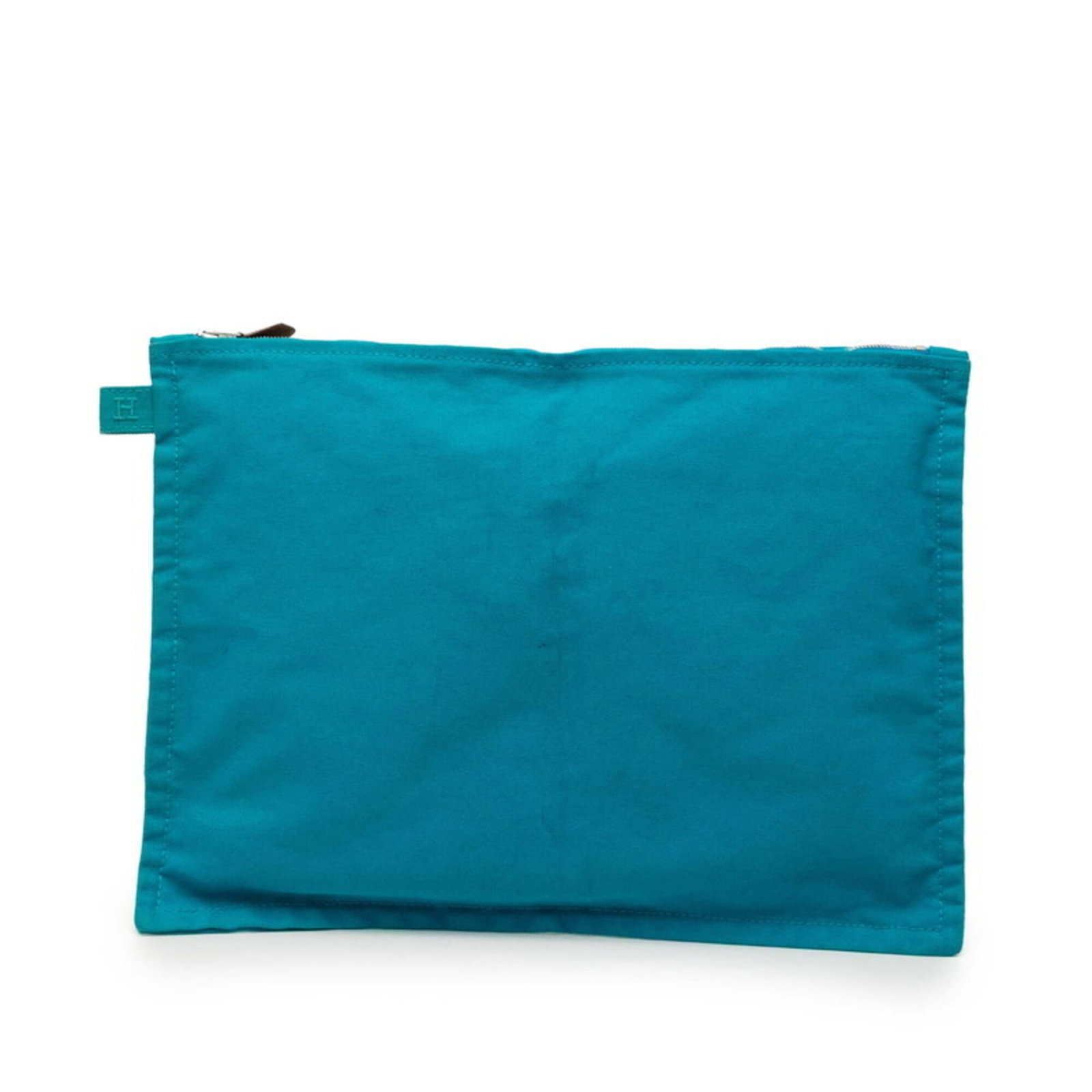 Hermes Pouch Handbag Canvas: Hermes Pouch Handbag Canvas Canvas handbag from iconic brand Hermes, featuring a blue hue and classic design. Measuring 26cm x 35cm, this used canvas pouch showcases subtle signs of wear and tear.