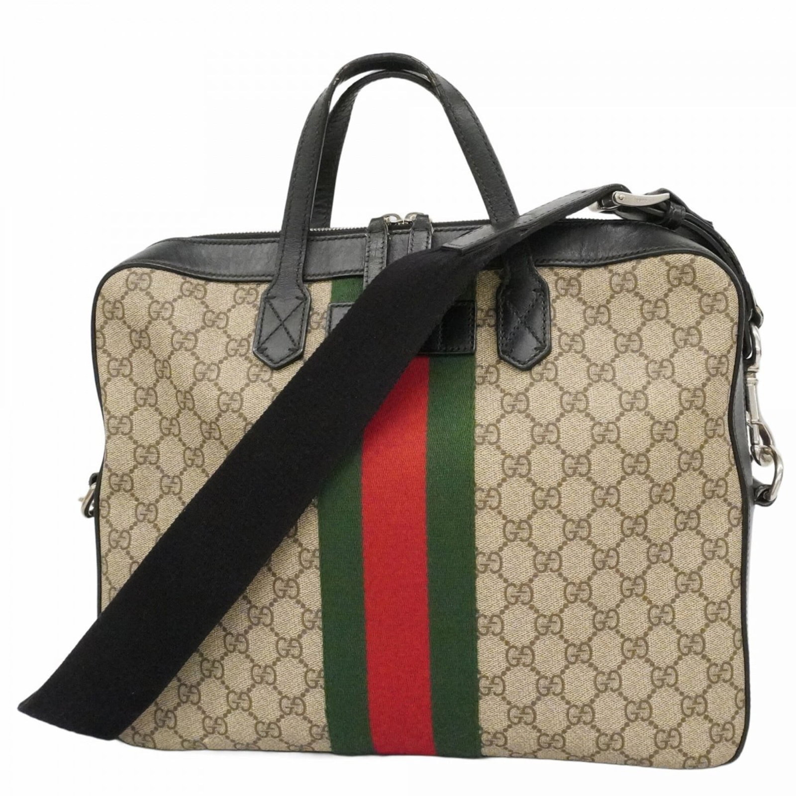 PVC Briefcase by Gucci: PVC Briefcase by Gucci This Gucci PVC briefcase boasts sleek, modern design with silver hardware in a classic black and brown color combination. With its durable PVC material and compact size, it's pe