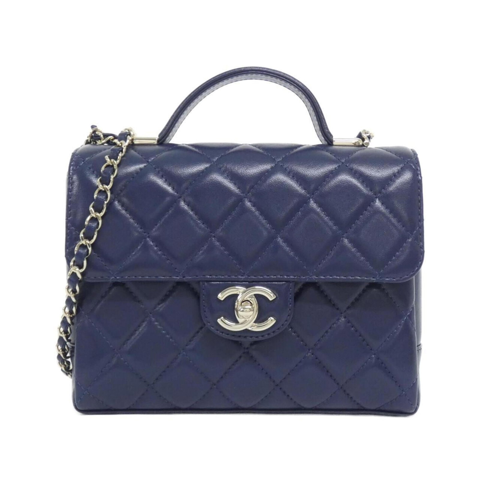 Chanel Handbag Leather: Chanel Handbag Leather Navy blue lambskin Chanel handbag with gold hardware, featuring a classic design and timeless elegance. Made from high-quality leather, this bag has a weighty feel at just 520g,