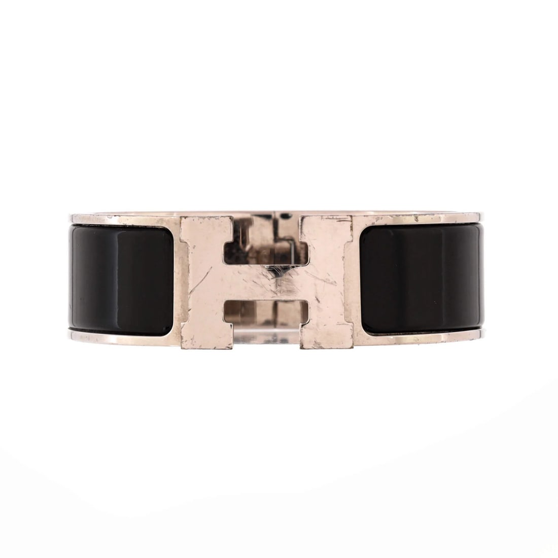 Clic Hermes Wide Bracelet Enamel: Clic Hermes Wide Bracelet Enamel The Clic H Bracelet Enamel Wide in black and silver features a striking enamel design. This wide bracelet boasts a classic style with moderate scratches, dings, and we