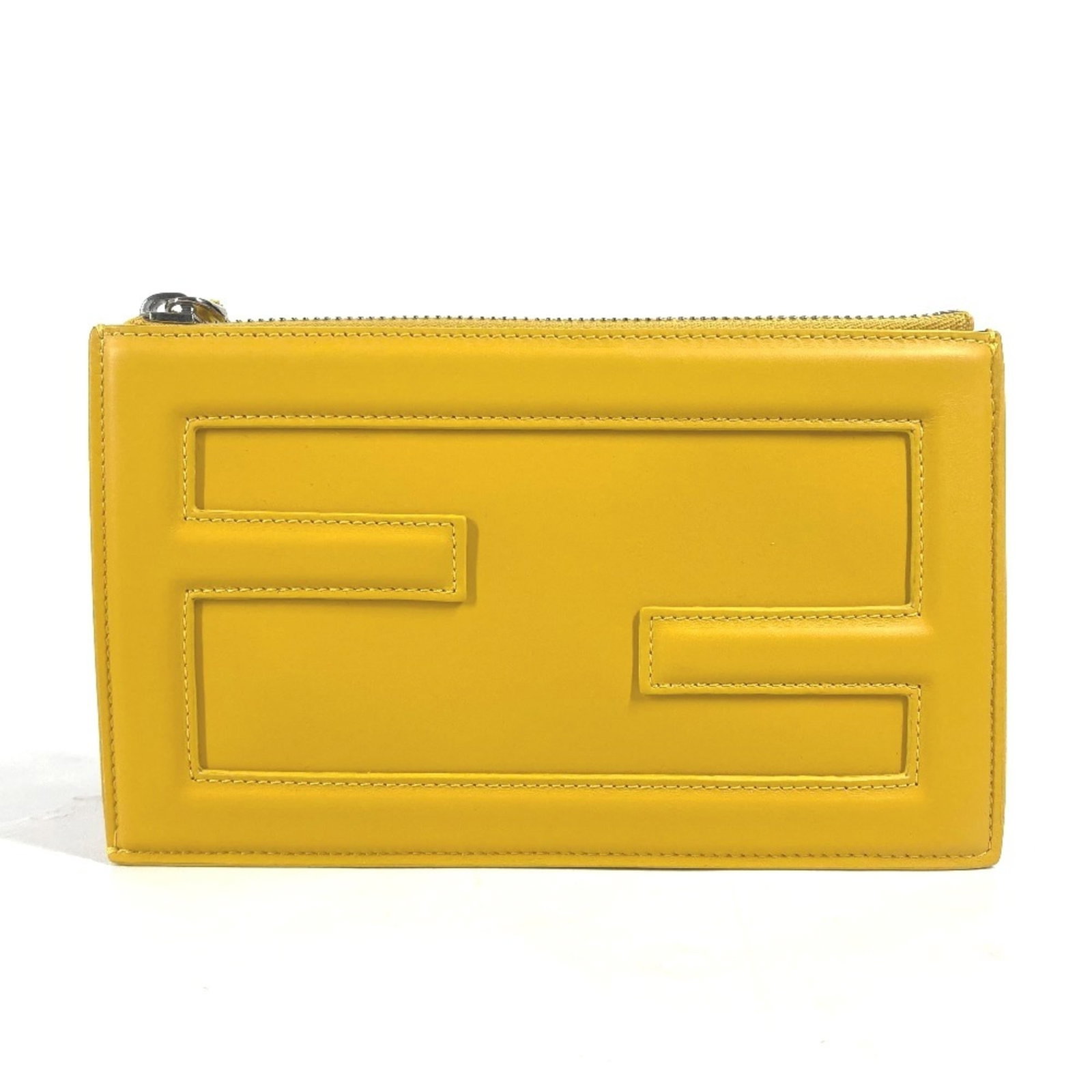 Clutch bag pouch leather Fendi: Clutch bag pouch leather Fendi Yellow Fendi leather clutch bag pouch, measuring 11cm x 18.5cm, in like new condition with hardly any traces of usage. This used item features high-quality leather const