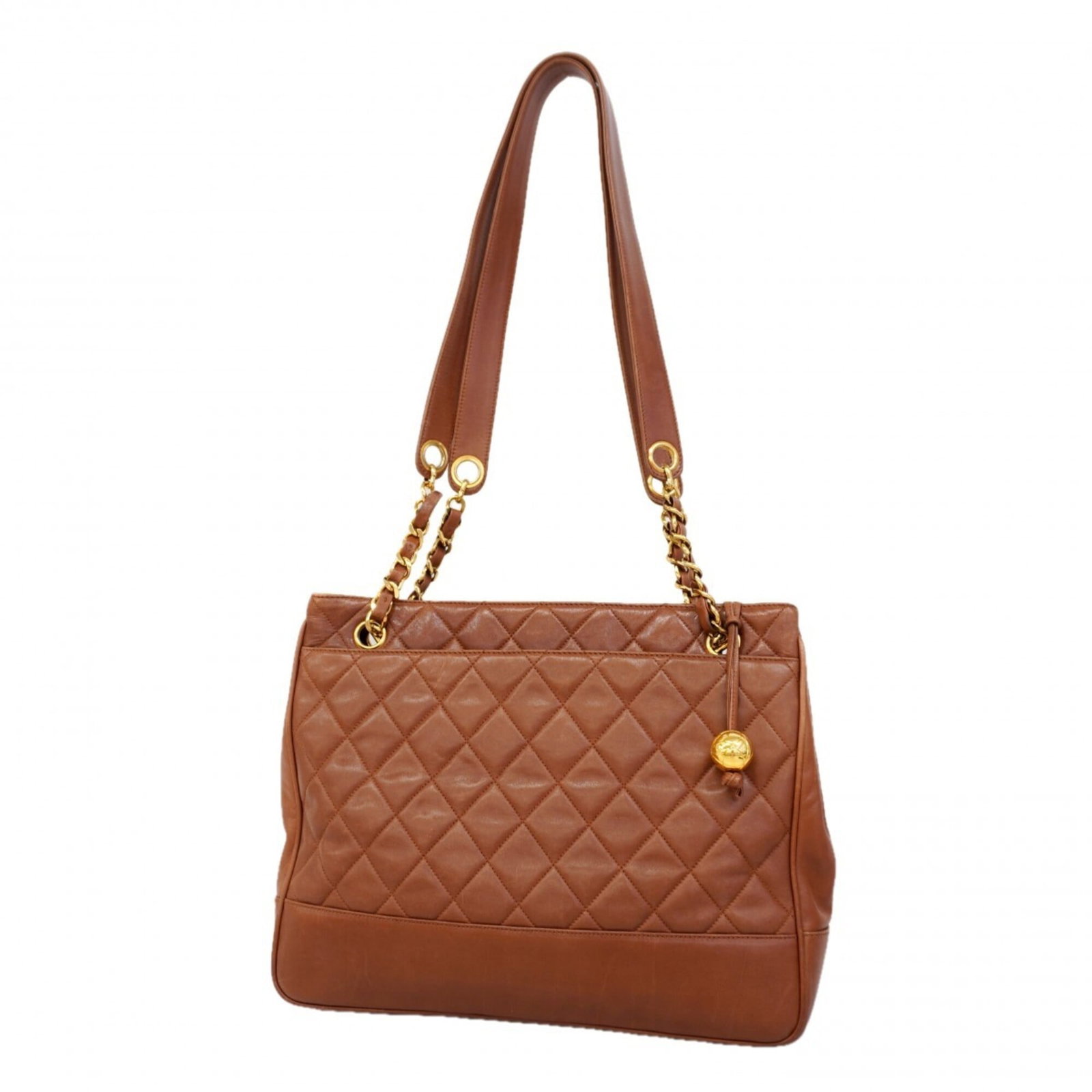 Tote Bag Leather from Chanel: Tote Bag Leather from Chanel Brown lambskin leather tote bag from Chanel, with gold hardware and a classic design. The bag has traces of usage, scratches, and dirt, but remains in good condition. This
