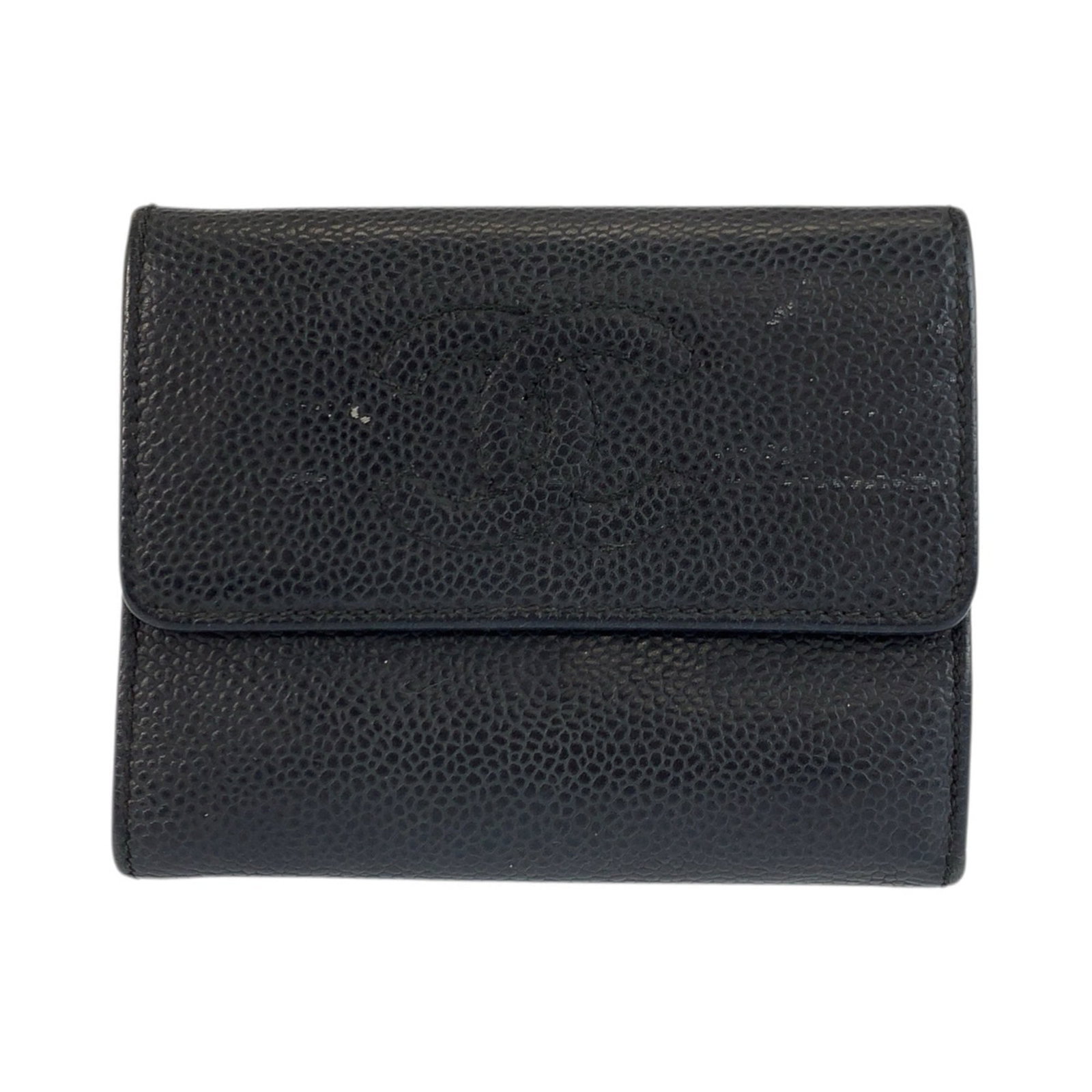 Leather Bi Fold Wallet By Chanel: Leather Bi Fold Wallet By Chanel Used leather bi-fold wallet by Chanel, featuring black color and subtle scratches. The classic design remains intact despite traces of usage, showcasing the timeless