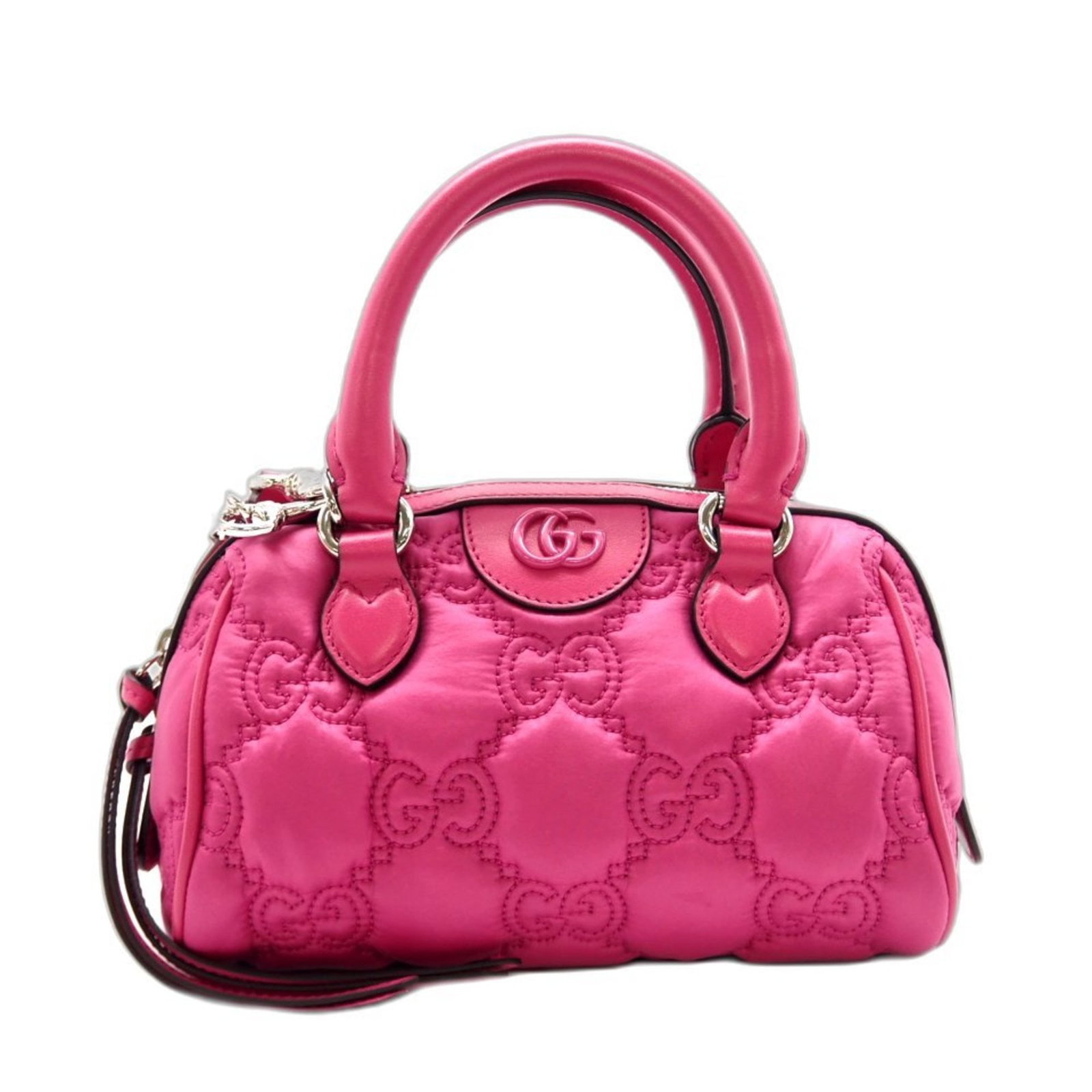 Nylon Bag By Gucci: Nylon Bag By Gucci Nylon Bag By Gucci - A Timeless Pink Classic. This pink nylon shoulder bag from Gucci boasts a sleek design and durable construction, making it a stylish and practical accessory for