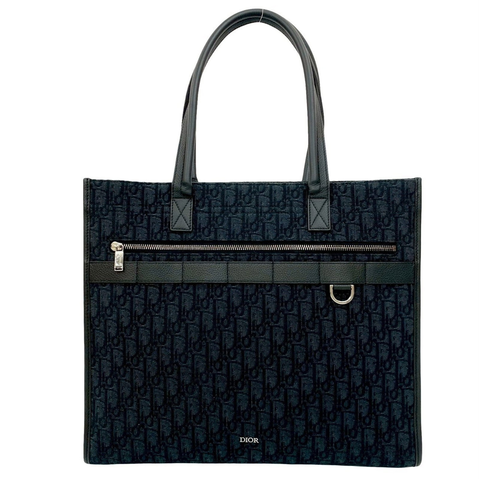 Christian Dior Tote Bag Canvas Leather: Christian Dior Tote Bag Canvas Leather Canvas and leather combine in this sleek, black Christian Dior tote bag. With its classic design and durable materials, it remains a stylish choice for everyday