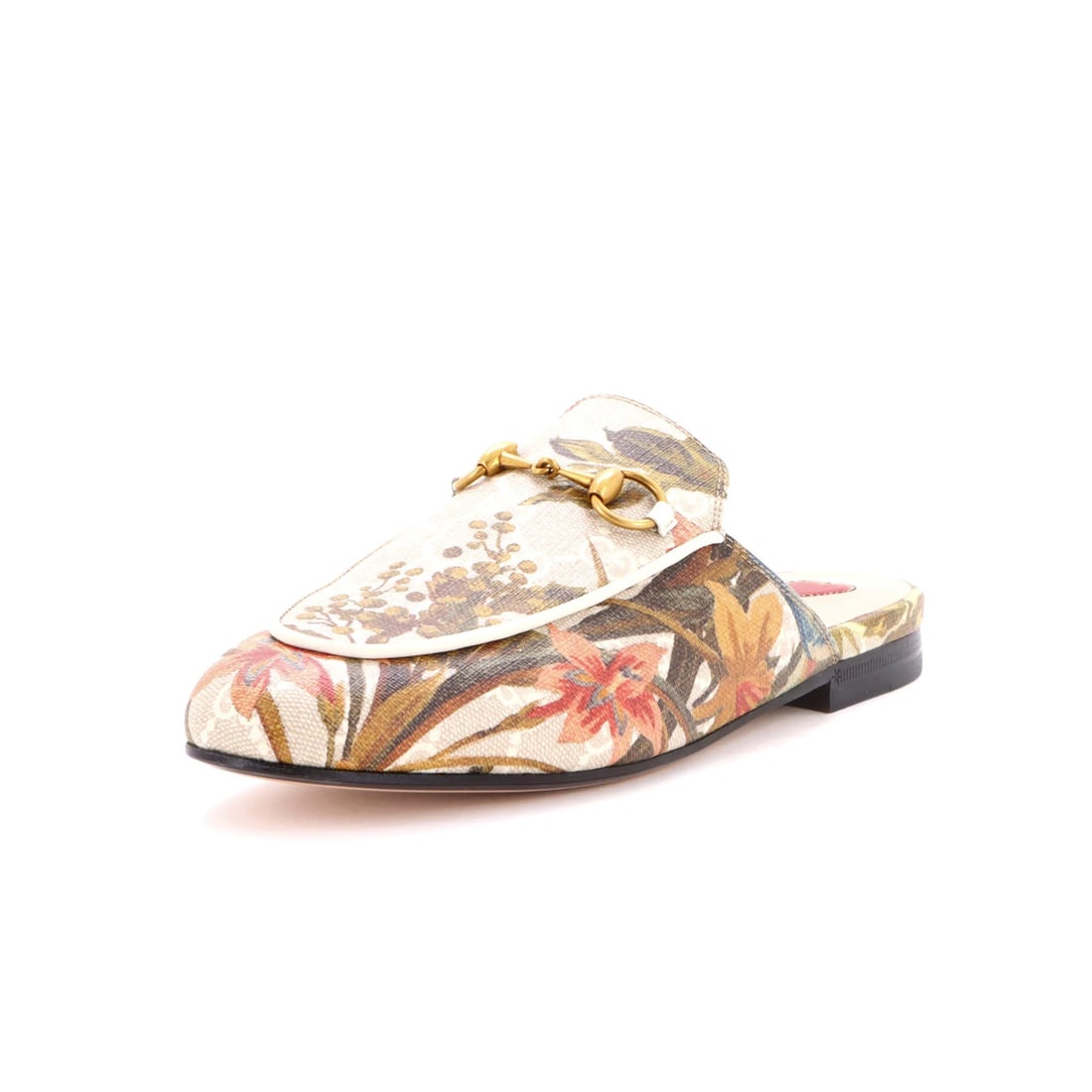 Women's Princetown Mules Printed GG Coated Canvas: Women's Princetown Mules Printed GG Coated Canvas Neutral canvas coated mules with printed GG logo, featuring light creases and scratches on aged gold hardware. The shoes are made from high-quality ca