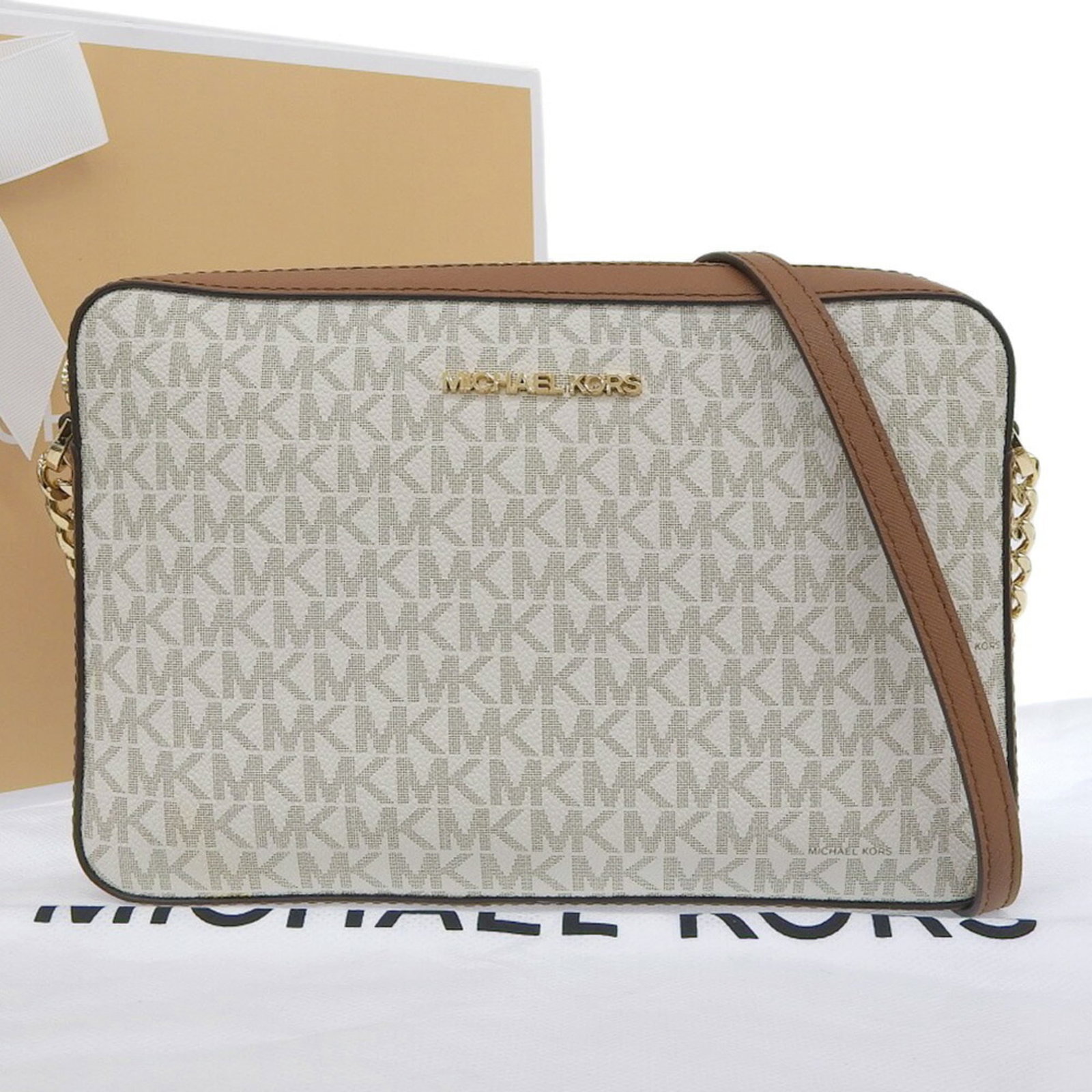 Shoulder Bag Michael Kors Pvc: Shoulder Bag Michael Kors Pvc The Michael Kors Pvc Shoulder Bag features a sleek, pvc design in brown and white. With its compact size (16.5cm x 24.5cm x 5cm) and durable construction, it's perfect fo