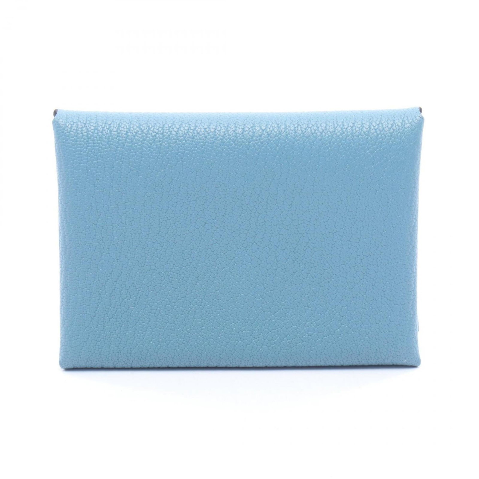 Hermes Coin Purse/ Coin Case Chevre Leather: Hermes Coin Purse/ Coin Case Chevre Leather Chevre leather coin purse from Hermes, featuring a classic design with a blue hue. The compact size and smooth texture make it a practical accessory for
