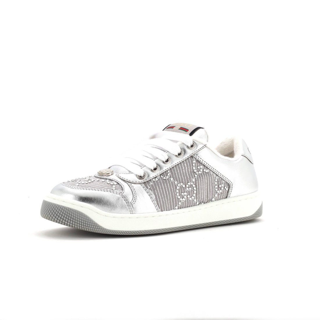 Gucci Sneakers with Leather and Crystals: Gucci Sneakers with Leather and Crystals Crystal-embellished leather Gucci sneakers in silver, featuring white leather interiors and sleek hardware. Minor imperfections such as creasing and scuffs are