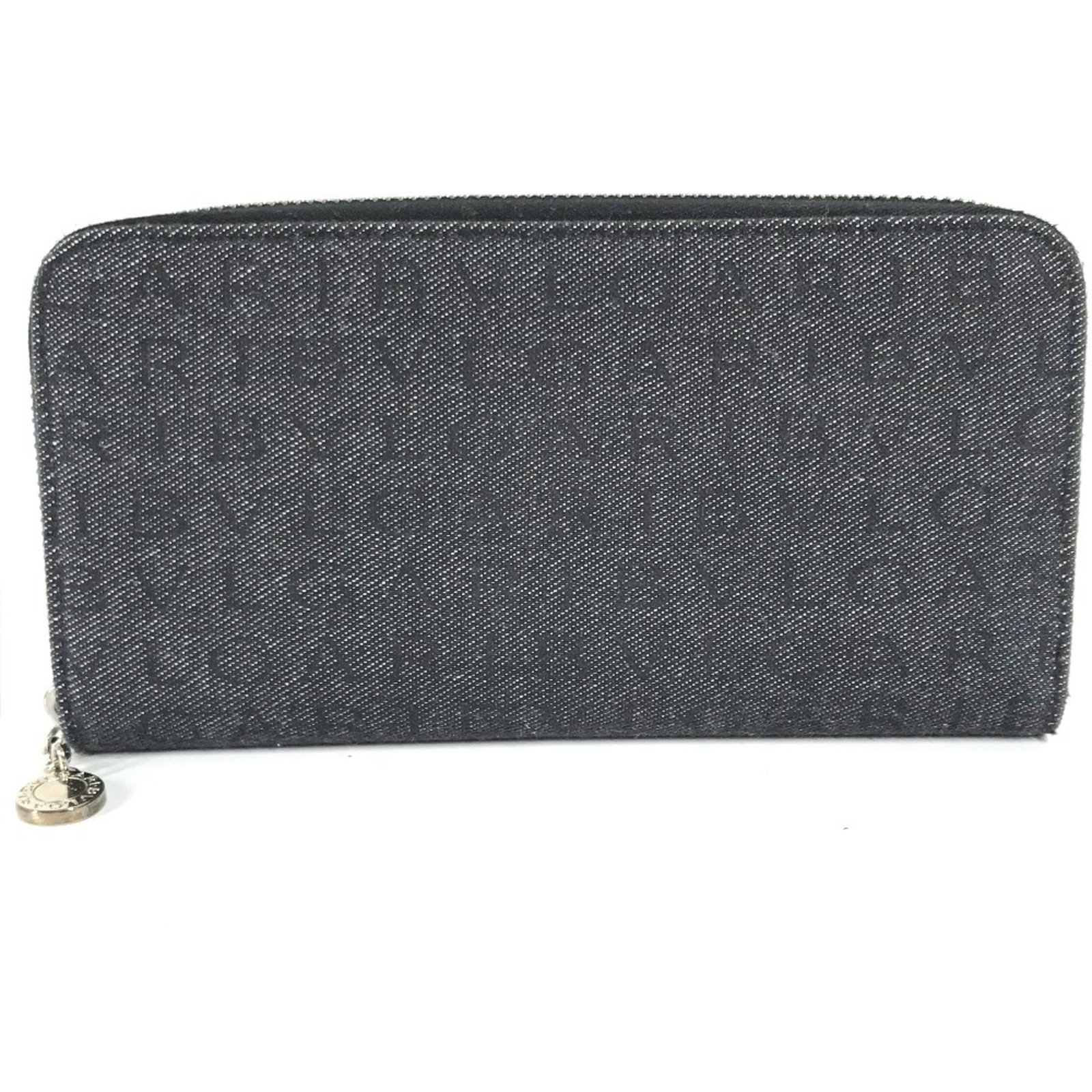 Long Wallet Bi Fold Denim By Bvlgari: Long Wallet Bi Fold Denim By Bvlgari Bvlgari's Long Wallet Bi Fold in Denim offers a stylish and functional design, featuring a bi-fold construction with a durable denim material. The blue color